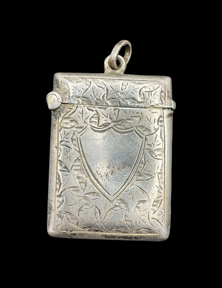 Gorgeous Ornate Antique British Sterling Silver Match Safe / Box Pendant: Very good vintage condition with minor patina according to age. Measures approx. 1 1/2" long and 1" wide and weighs ca. 14.6 grams. Tested for Sterling Silver.