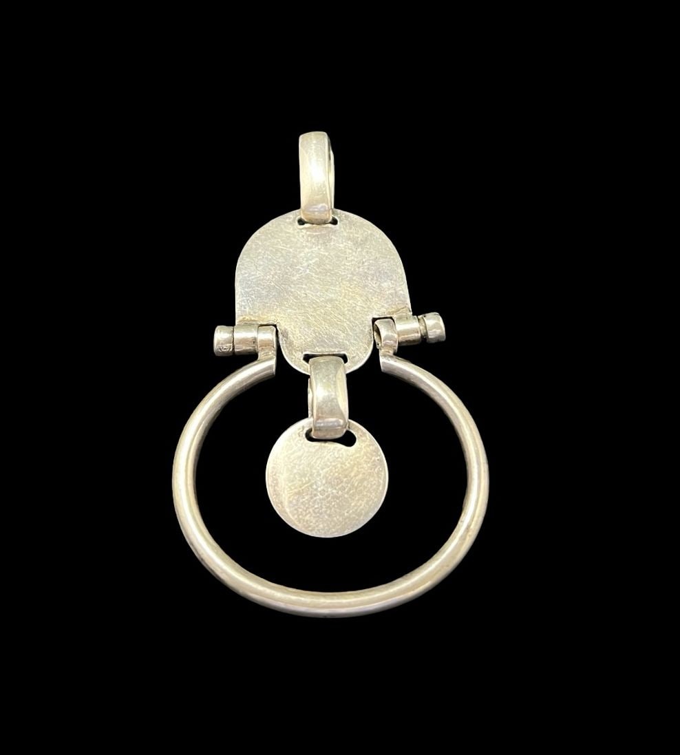 Unusual Vintage Gilt Sterling Silver Pendant: Very good vintage condition with minor patina according to age. Measures approx. 2 3/4" long and 1 1/2" wide and weighs ca. 17.8 grams. Marked for Sterling Silver.