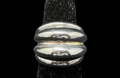 Very Unusual Vintage Mid-Century Modern Sterling Silver Ring: Very good vintage condition with minor patina according to age. The ring is a size 6 and weighs ca. 12.1 grams. Marked for Sterling Silver.