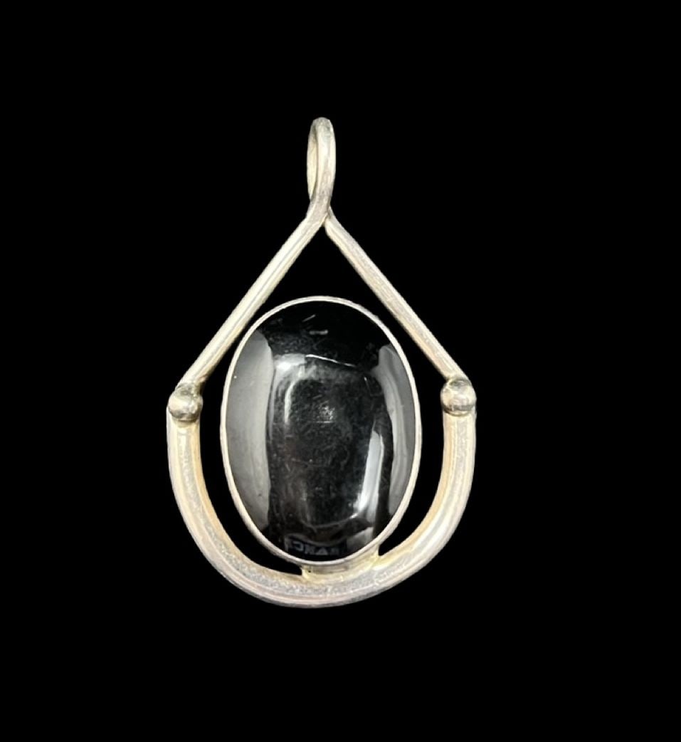 Amazing Ornate Vintage Sterling Silver & Black Onyx Pendant: Very good vintage condition with minor patina according to age. Measures approx. 2" long and 1 1/4" wide and weighs ca. 15.3 grams. Marked for Sterling Silver.