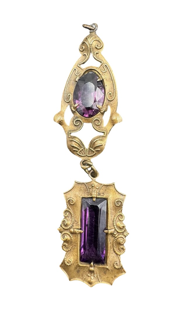 Unusual Antique Victorian Gold Plated Purple Gemstone Pendant: Very good antique condition with minor patina according to age. Measures approx. 1" wide x 3 1/2" long and weighs ca.10.44 grams.
