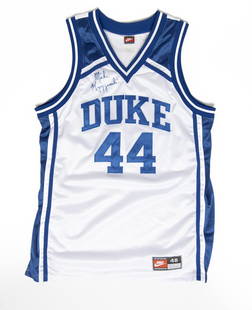 Mike Krzyzewski Duke Blue Devils Autographed Jersey: Signed in blue marker. Made in USA Date: 1994-95 Brand: Nike Size: 48: 23"x34" Color: White