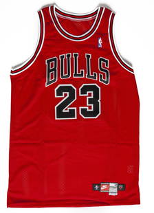 Michael Jordan Chicago Bulls Away Jersey: Pro cut. Made in USA Date: 1997-98 Brand: Nike Size: 48 +4": 23.5"x37" Color: Red