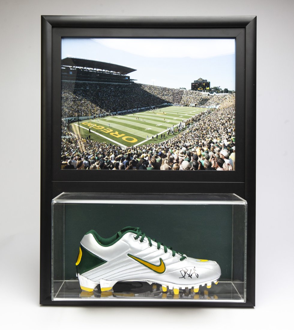 Phil Knight Oregon Ducks Autographed Cleat (1 of 2)