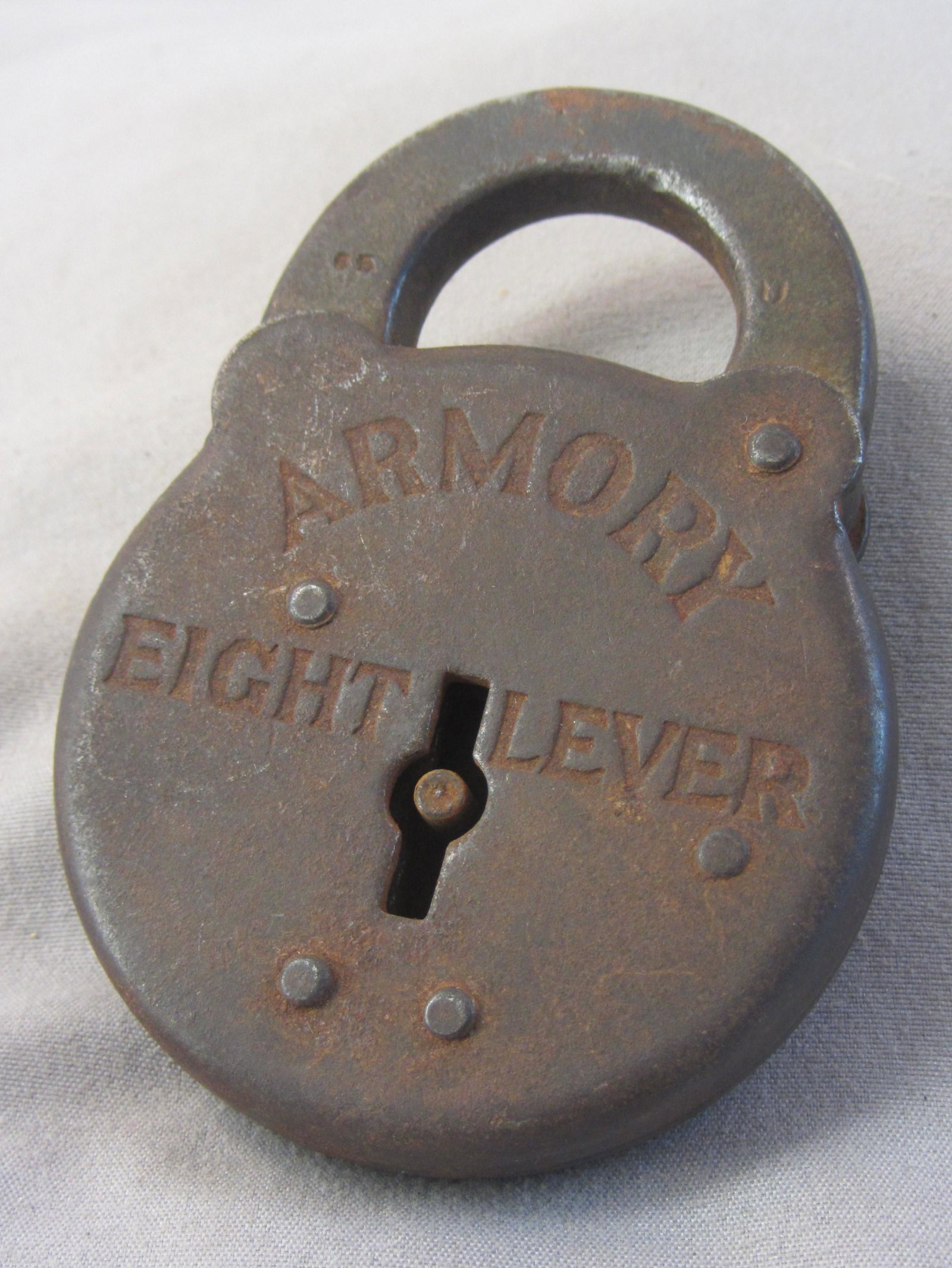 "Armory" Padlock: 8 lever lock no key. Shank embossed with 65 &U