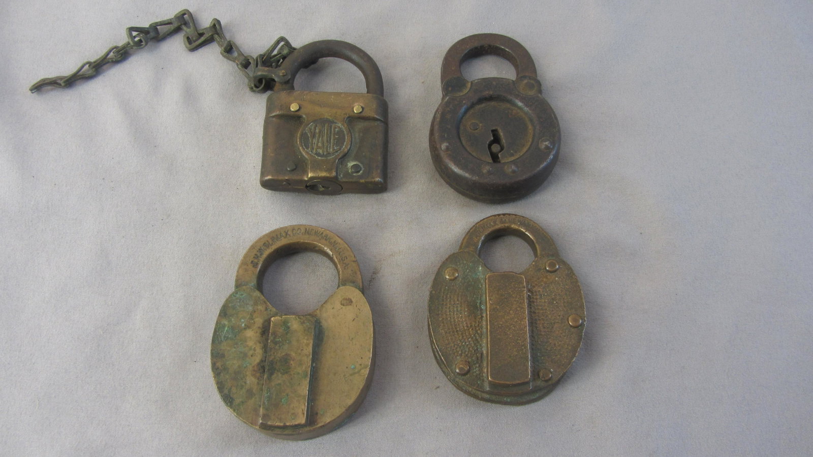 Opportunity lot , Yale , Ollie Max, JHW: One is stamped steel to a solid brass one is brass with a steel Shank and chain