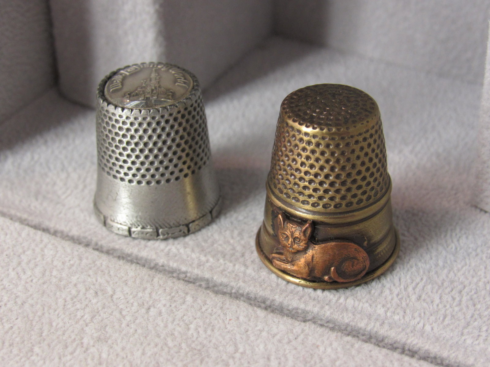 Pair of Themed thimbles. Disney, Feline.: Pair of Themed thimbles Walt Disney World and cat.