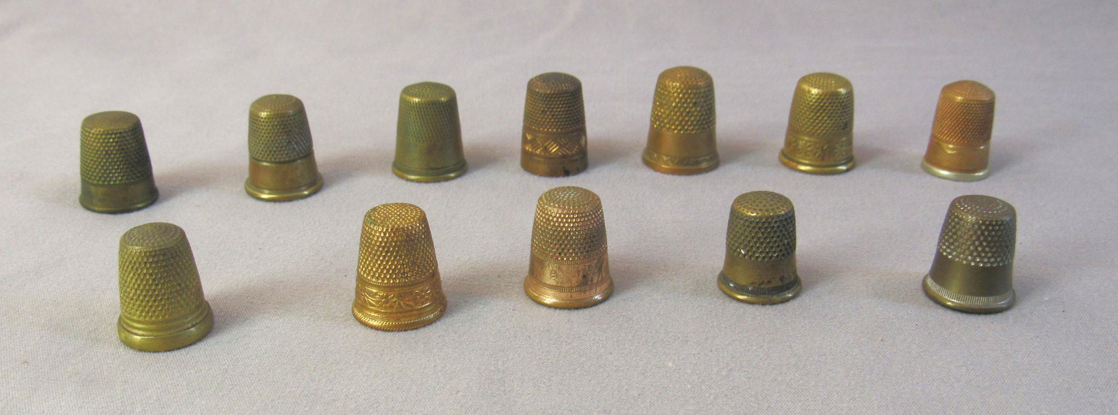 Lot of 12 brass thimbles: Lot of 12 brass thimbles