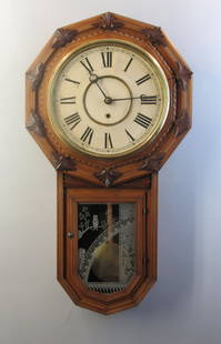 Gilbert Clock C. Timepiece ~ Long Drop Fancy: This eight day Gilbert timepiece in beautiful old finish with great original silk screened glass with owl.