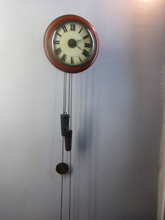 11 inch Round "Wag on the Wall" Clock: 11 inch wag on the wall Clock with two original weights.