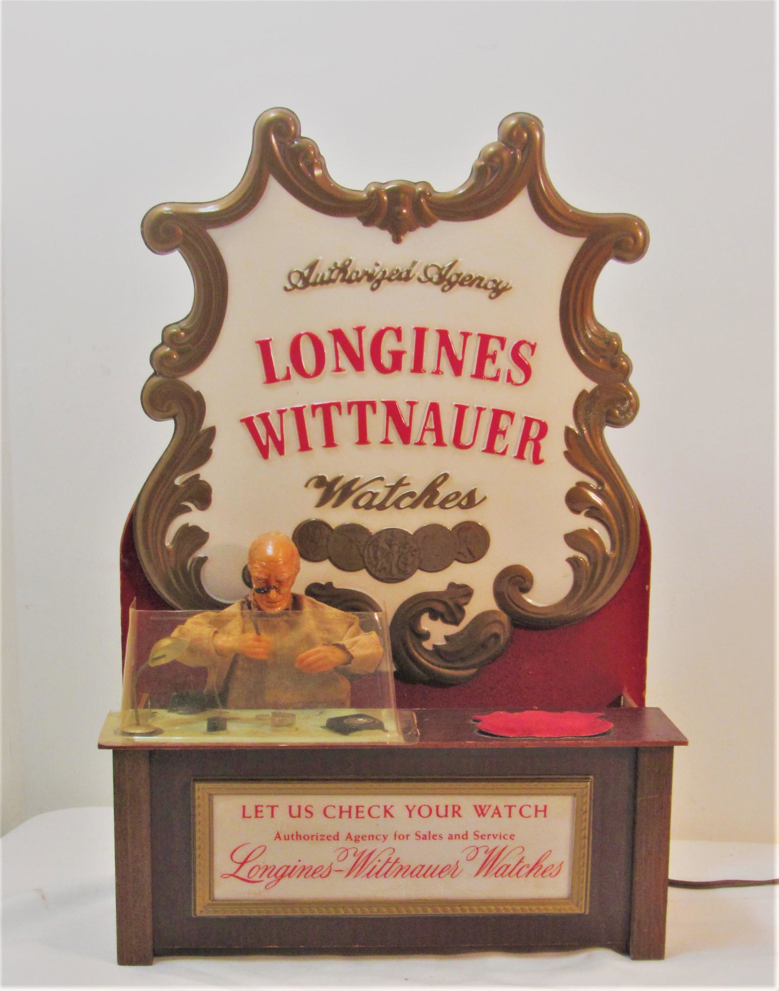 Whittnauer Automaton Watchmaker Display: Whittnauer Display. Automaton watchmaker at bench is animated leaning over, up and down at bench. A rare find.