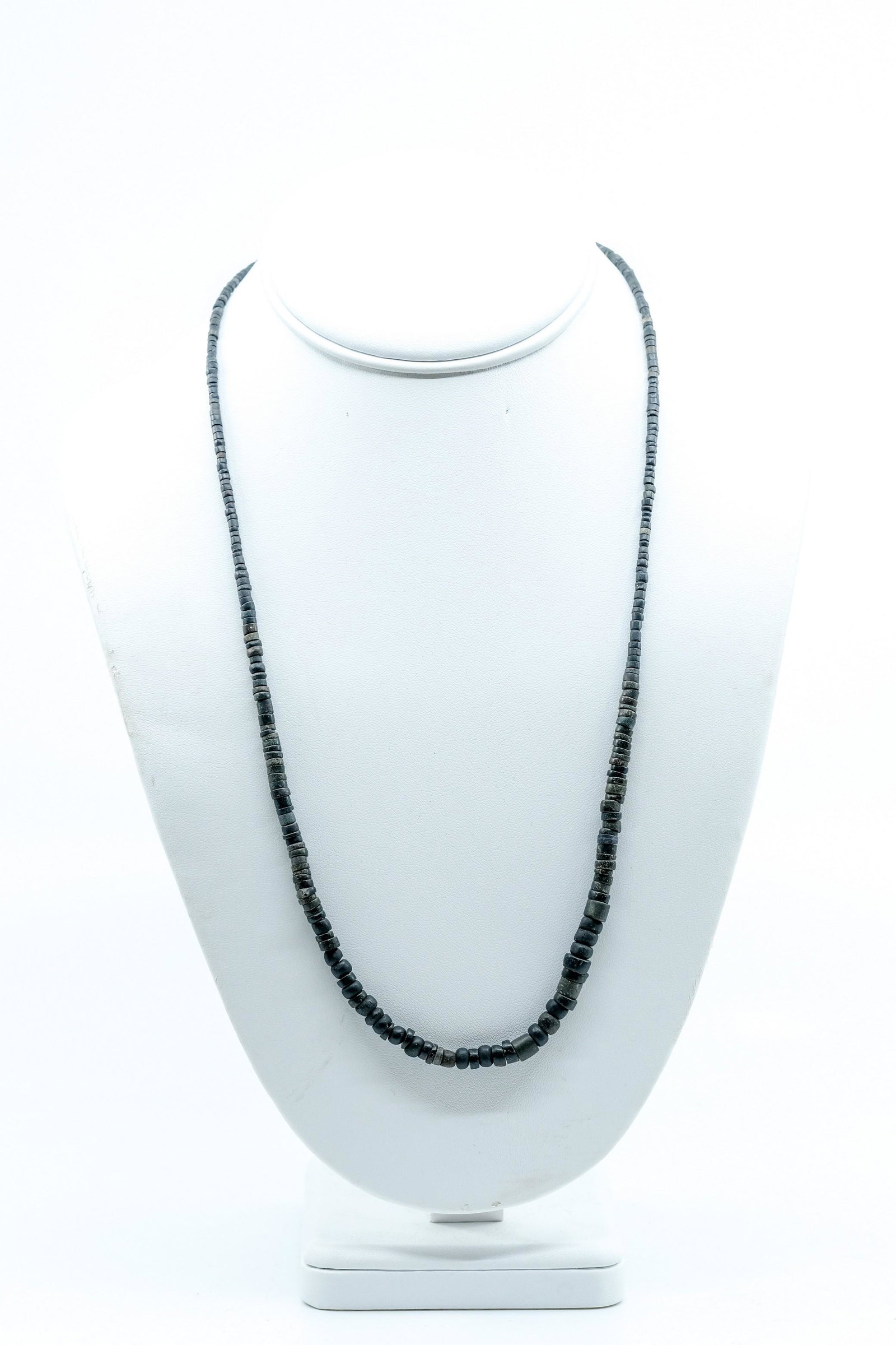 Pre-Columbian Moche Dark Stone Bead Necklace: Pre-Columbian Moche Dark Stone Bead Necklace, Dark stone beads in various shades of black, grey and dark brown, Moche civilization, Age: 200-500 A.D. - Measurement: Drop Length: 11" Weight: .7 OZ.