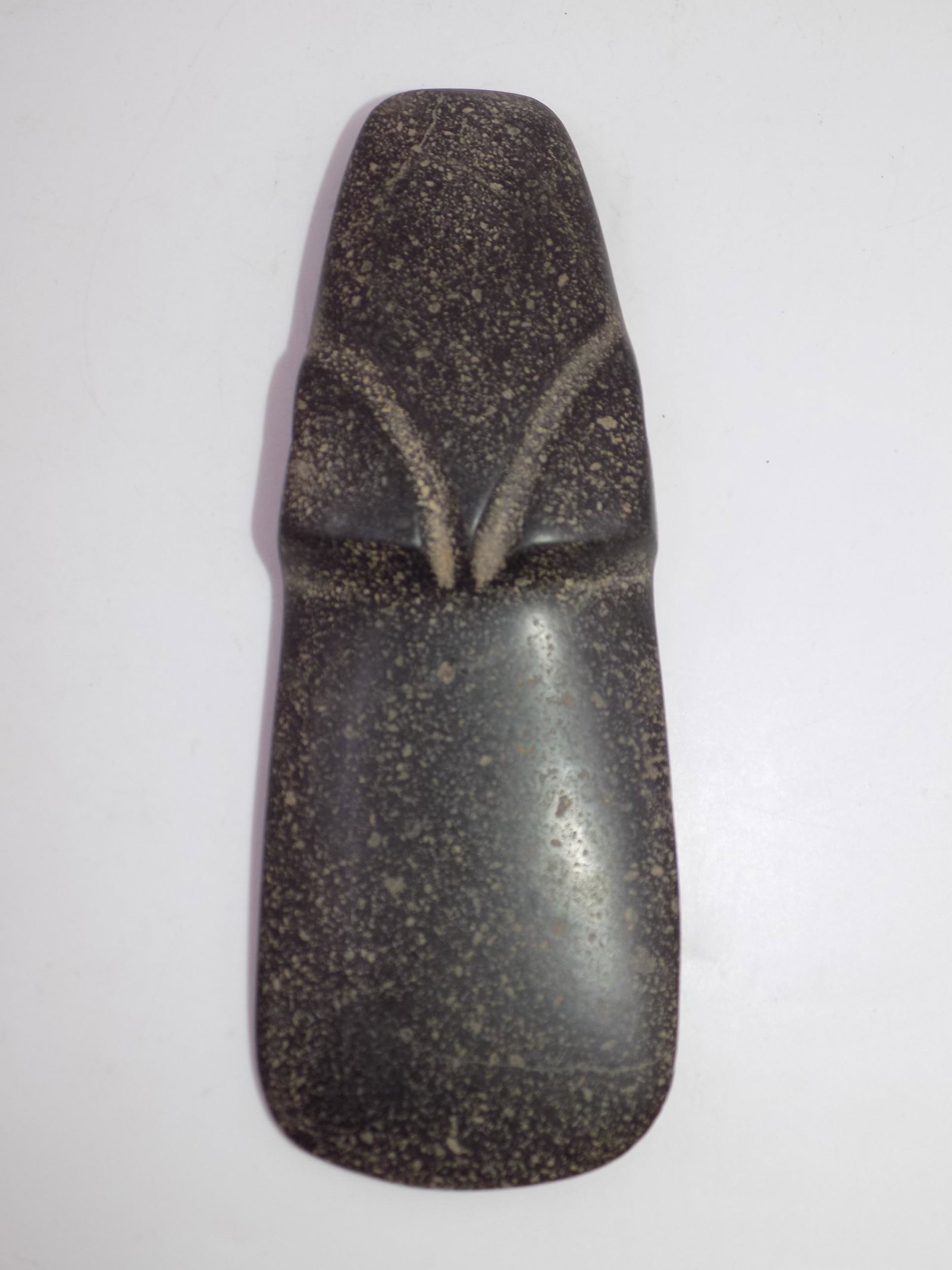 Pre-Columbian Black Jade Abstract Axe God: Pre-Columbian Black Jade Abstract Axe God, Origin: Costa Rica, 500 A.D.-800 A.D. Measurements: 5 3/4" L x 2 1/8" W, Weight: 7.1 OZ.