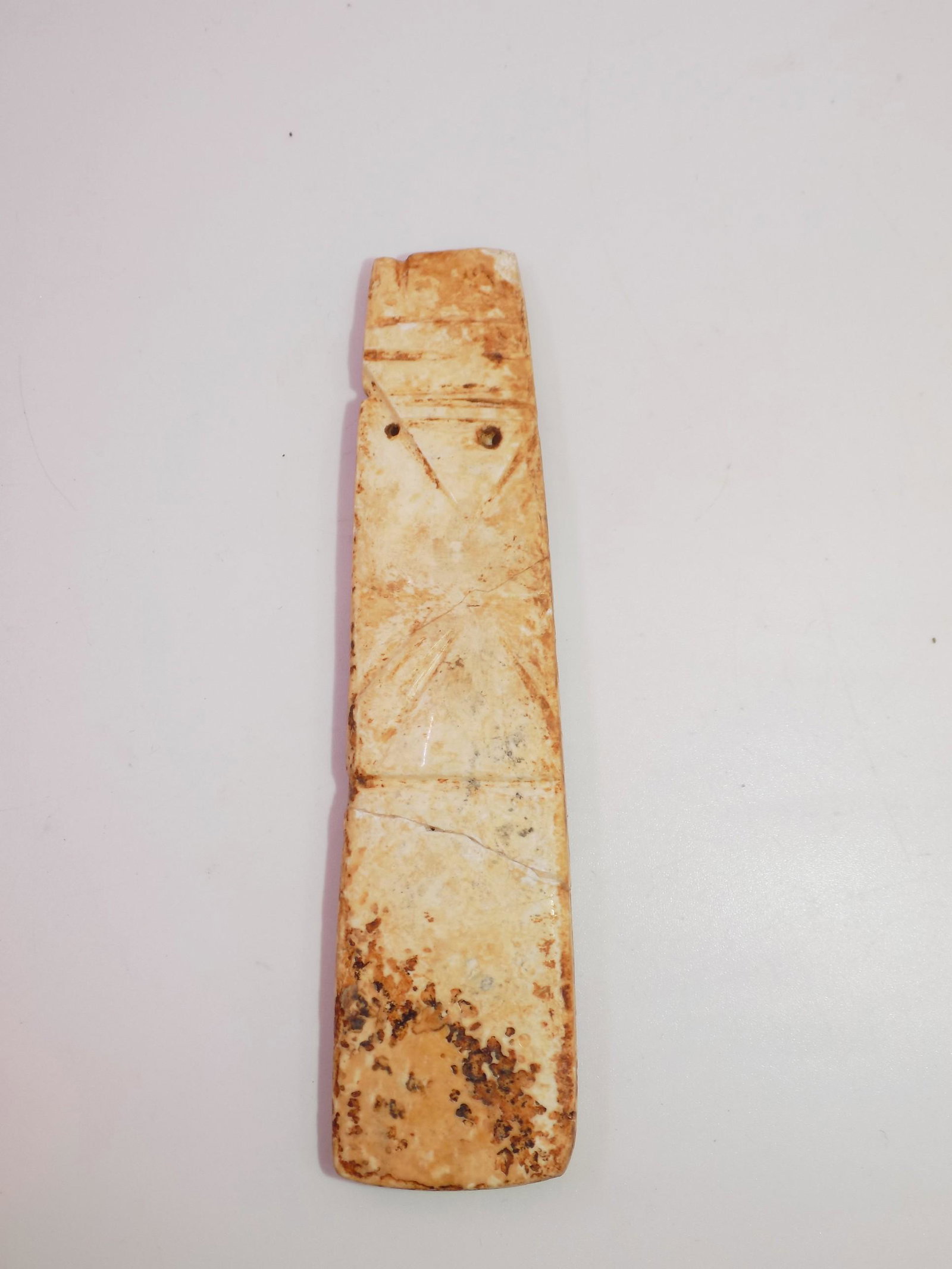 Pre-Columbian Shell Avian Axe God: Pre-Columbian Avian Axe God, Shell material, Very patinized and mineralized. Measurements: 4 1/2" L x 1" W, Weight: 1.1 OZ.