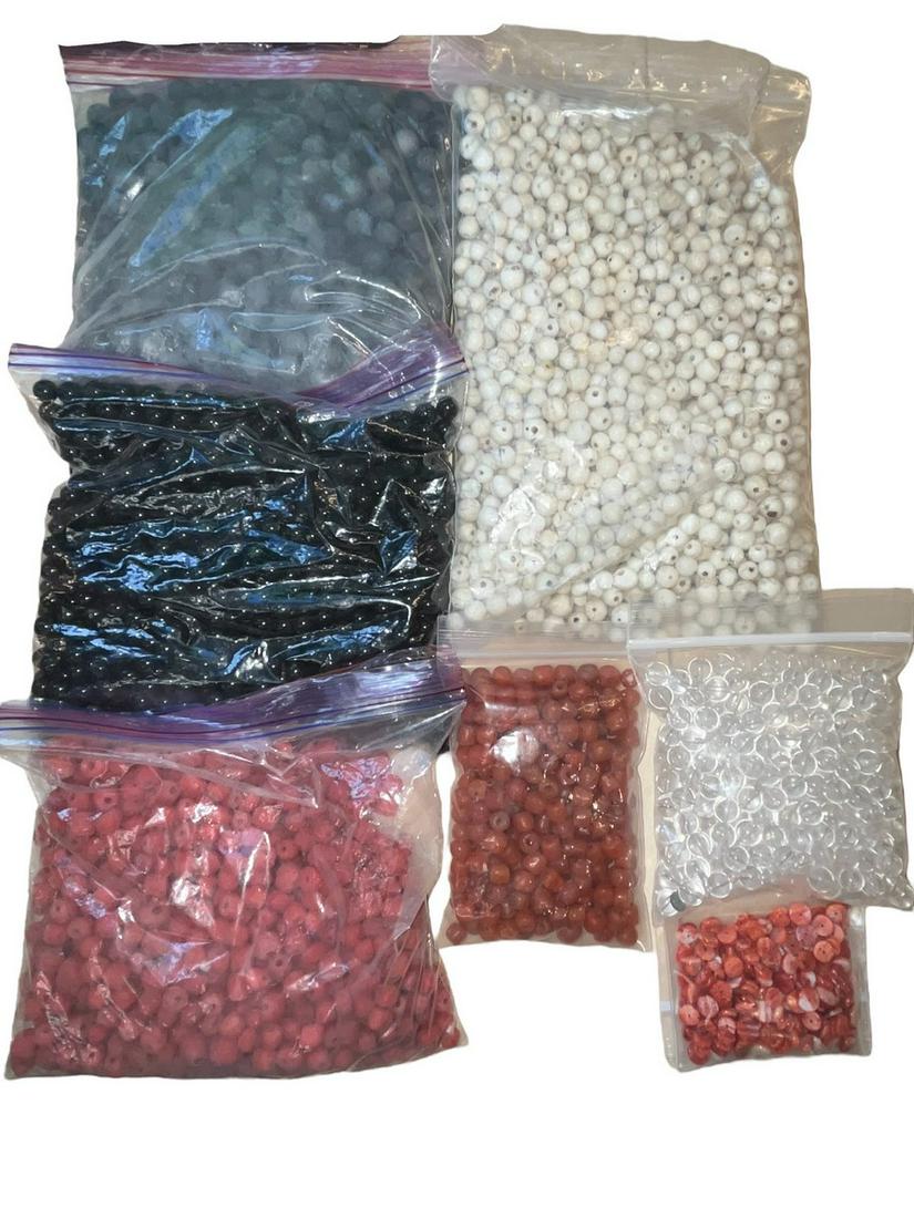 Large Lot Of Beads: Large Lot of Beads, Carnelian, Fossilized Coral, Unpolished Onyx, Quartz, Onyx, Glass, and Spondylus. Measurements: Beads Range In Size From 5 MM to 10 MM, Entire bead collection can fit into a gallon