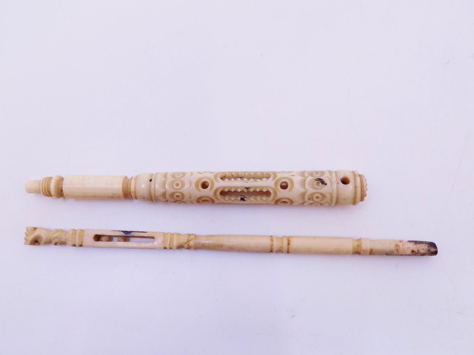 Antique Carved Objects: Antique Carved Objects, Pair., Measurement: 1.) 4 5/8" L x 1/2" W, 2.) 5 1/2" L x 1/4" W, Weight: .8 OZ.