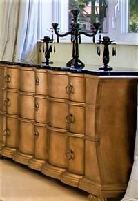 48" three Draw Gold Console with Granite Top. This incredible piece was purchased at Neiman Marcus: 48" three Draw Gold Console with Granite Top. This incredible piece was purchased at Neiman Marcus and features a Scalloped Front Design with matching Black Granite Scalloped Top. Each Draw has three