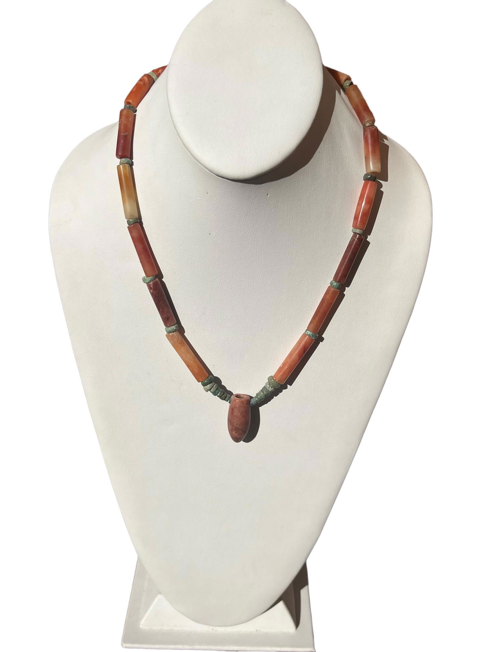 Pre-Columbian Green Stone, Jasper and Carnelian Necklace: Pre-Columbian Green Stone, Jasper and Carnelian Necklace, Carnelian bullet pendant. Measurements:Drop Length: 11" L