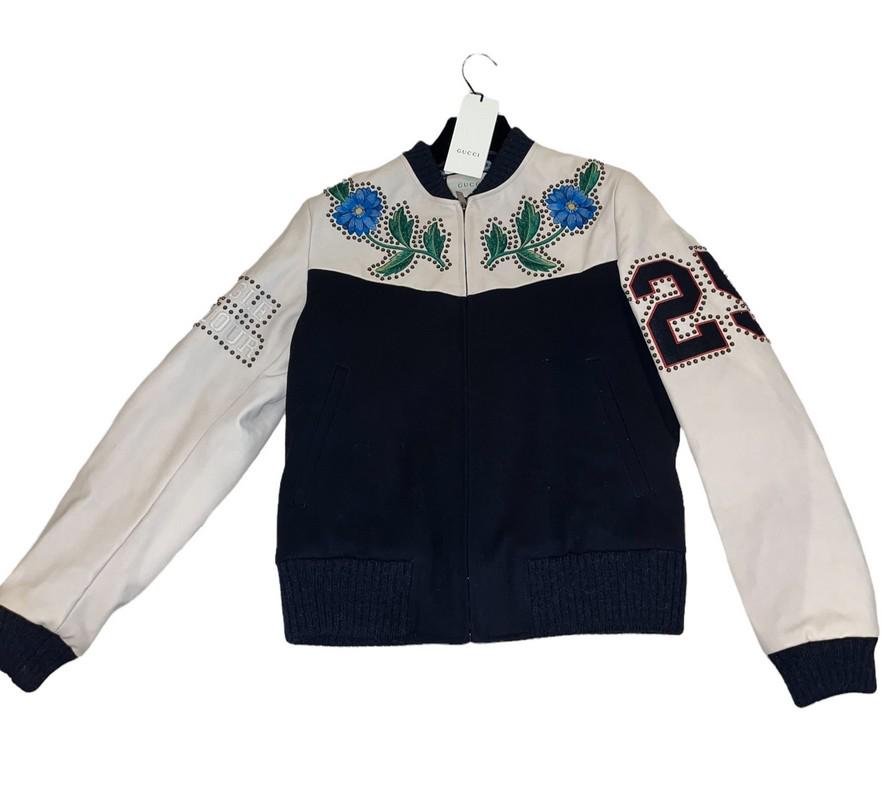 Gucci Wool Bomber Jacket: Gucci Wool Bomber Jacket, Size 46 (XL), From the Fall/Winter 2016 Collection by Alessandro Michele, Graphic print, Sating Lining, Embroidered & studded accents, Slit pockets and zip closure. Measureme