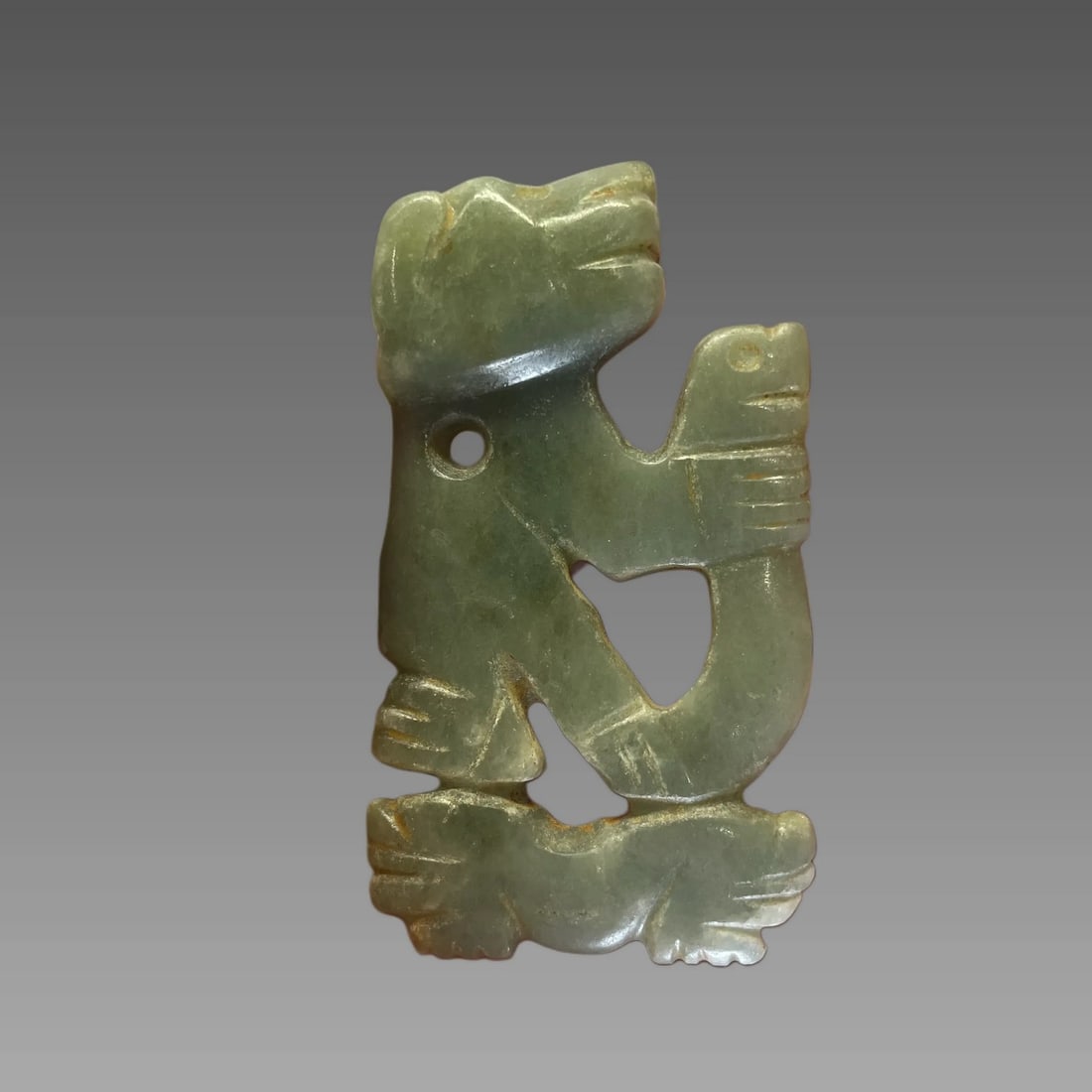 Pre-Columbian Jade Stacked Figure Penadnt, Costa Rica: Pre-Columbian Jade Stacked Figure Pendant, Translucent Jadeite Jade, Animal Carving Dipictions, Atlantic Watershed Region Costa Rica, 500-800 C.E. 1.5 x 2.5 in