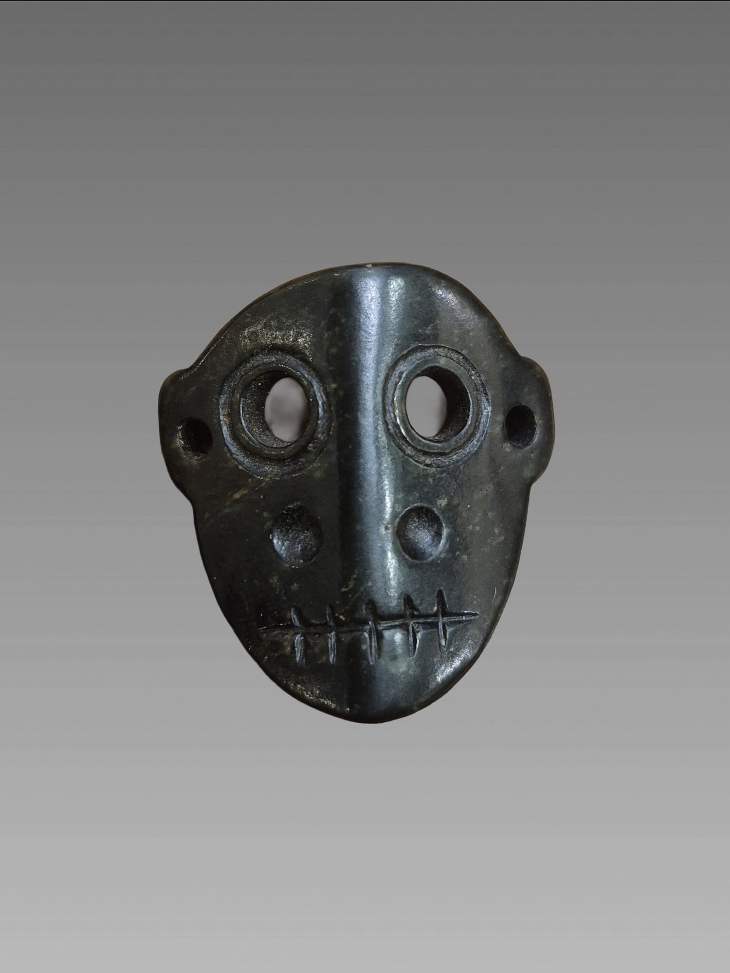 Pre-Columbian Jade Maskette, Mayan: Pre-Columbian Jade Maskette, Mayan Maskette, Translucent Jade, Mesoamerican, 300-800 AD - Not all measurement(s) are exact, this is an approximation to be use for shipping quotes only: .5" x .5" x .5"