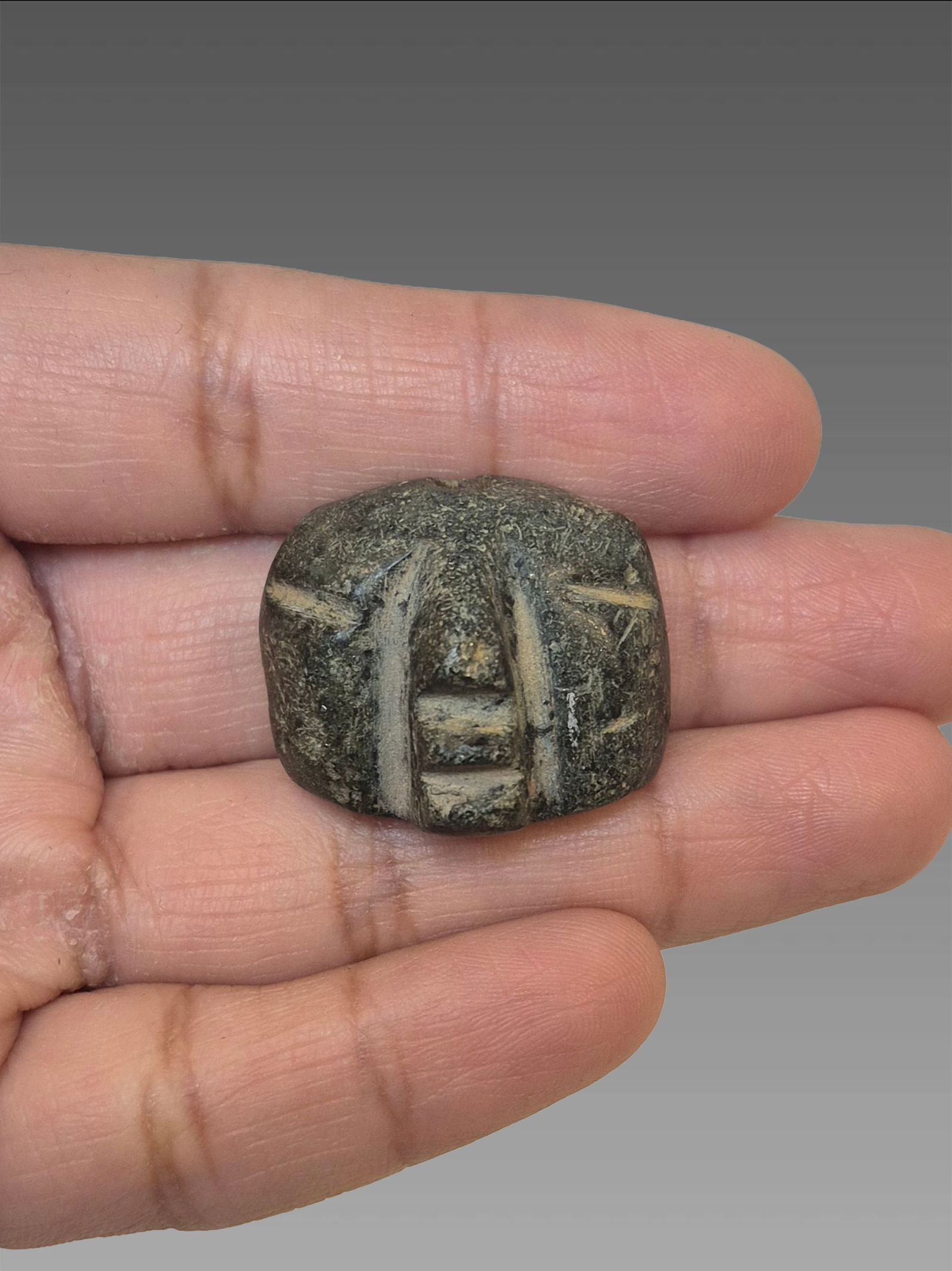 Pre-Columbian Mezcala Maskette, Jade: Pre-Columbian Mezcala Maskette, Jade, Mesoamerica, 100-700 CE - 1"x1"