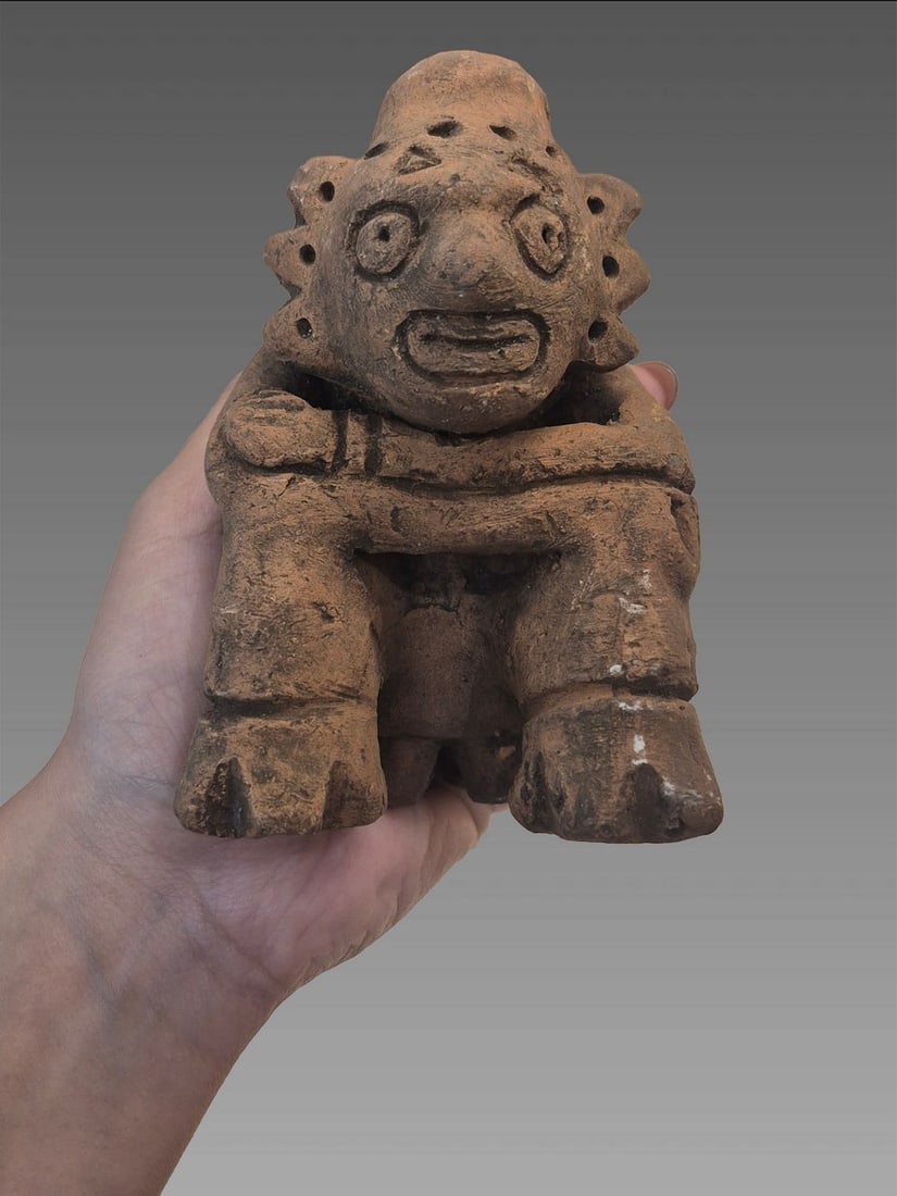 Pre-Columbian Taino Ceramic Seated Figure: Pre-Columbian Taino Ceramic Seated Figure, Taino Culture, 800-1200 CE Dimensions: 3"x4"