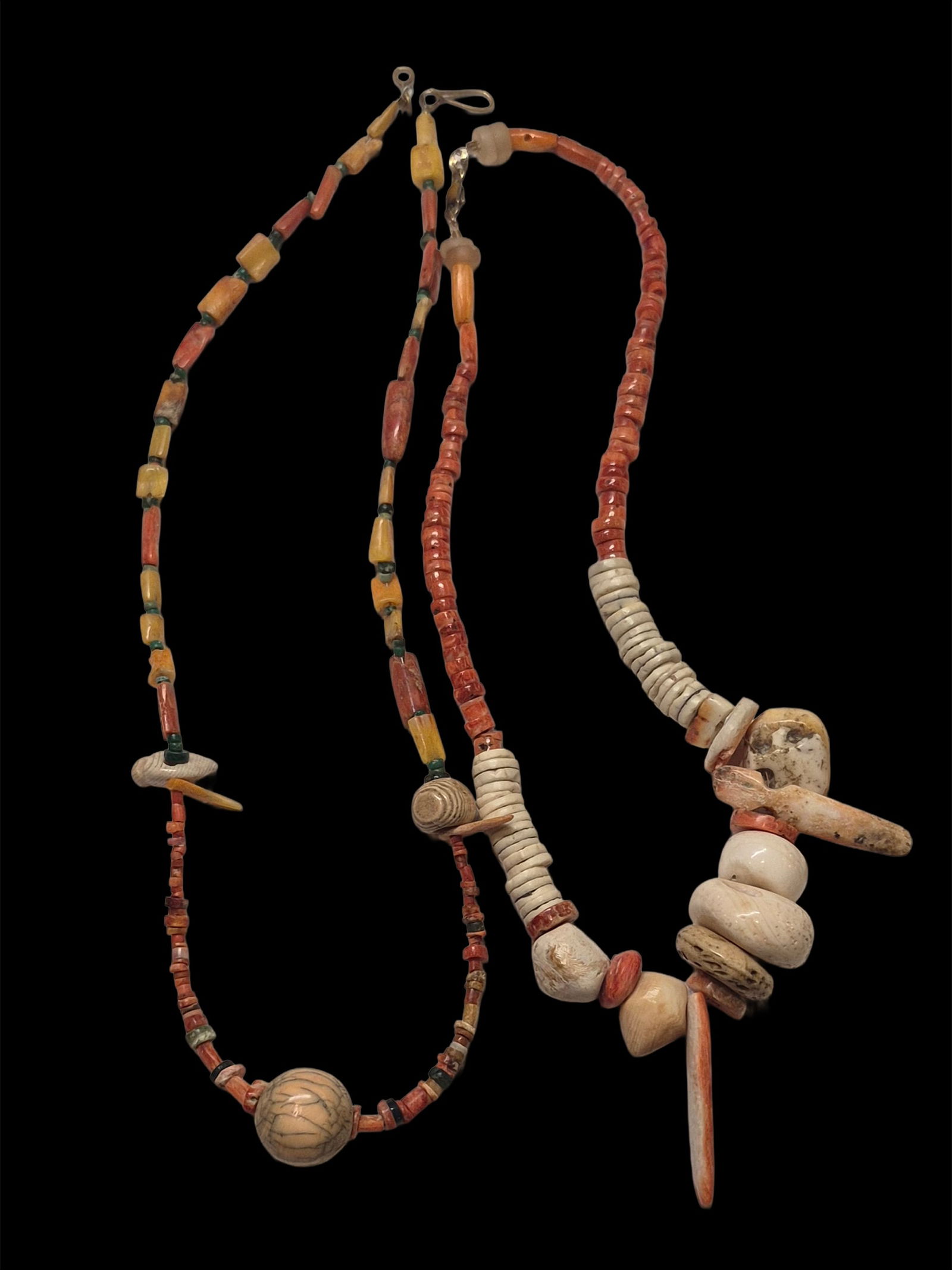 Pair of Pre-Columbian Spondyllus and Shell Necklaces: 14" and 17" Pair of Pre-Columbian Spondyllus and Shell Necklaces, Shell and Spondyllus Beads, South America, Colombia 800-1200 A.D., Strand Length 14" and 17"