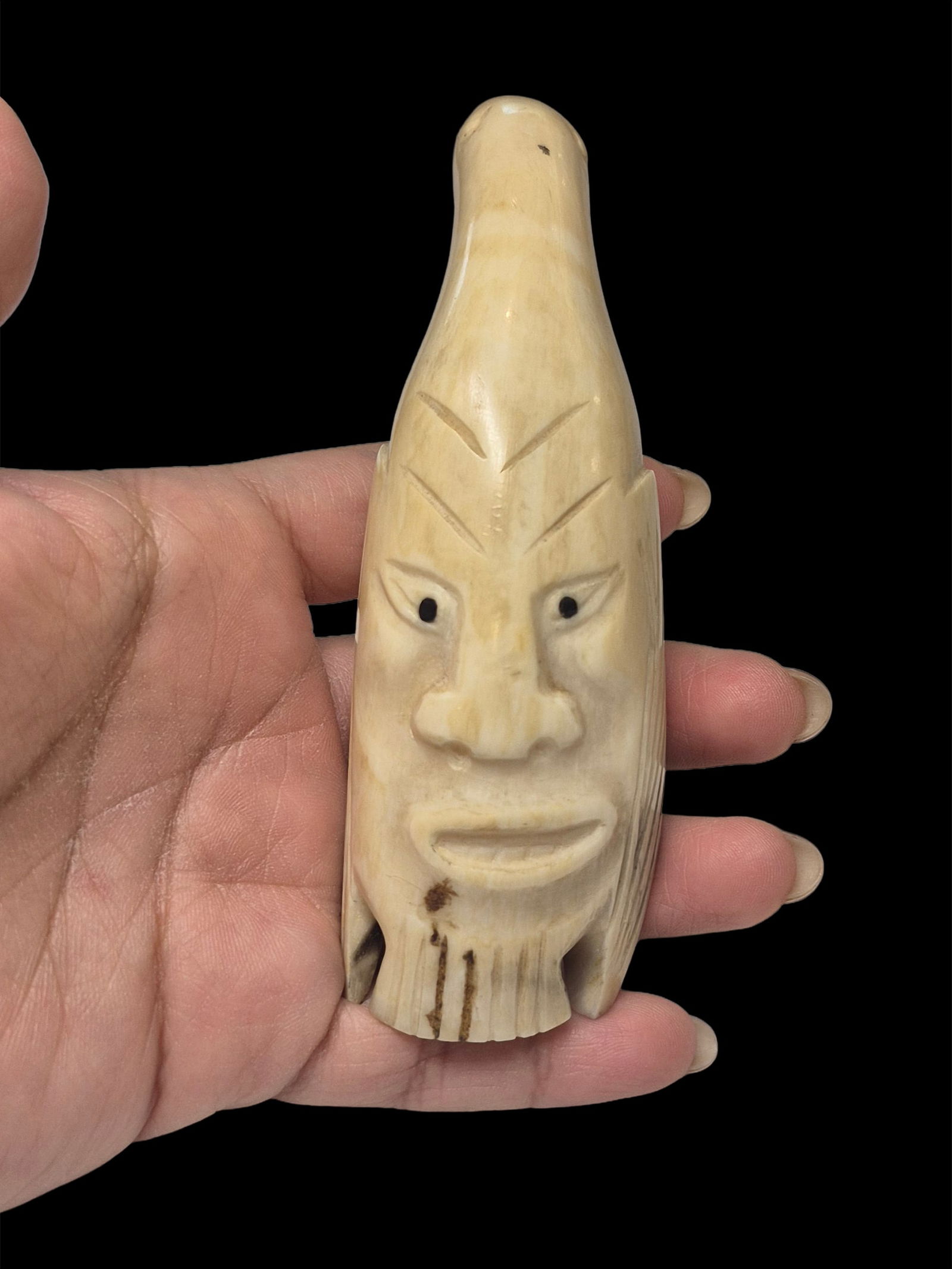 Antique Inuit Tooth Carving with Face and Seal Motif: 1.5"x4.8" Antique Inuit Tooth Carving with Face and Seal Motif