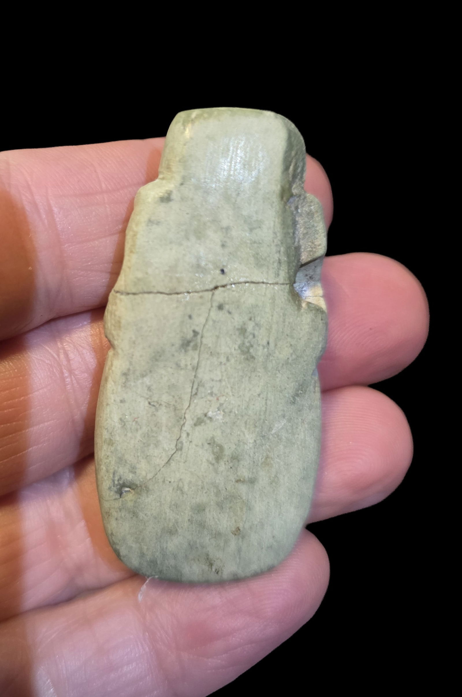 Pre-Columbian Axe God pendant from Central America: 2" x .75" Pre-Columbian Axe God pendant from Central America,The item shows signs of age, including a crack , Nicoya Costa Rica, 300-900 CE