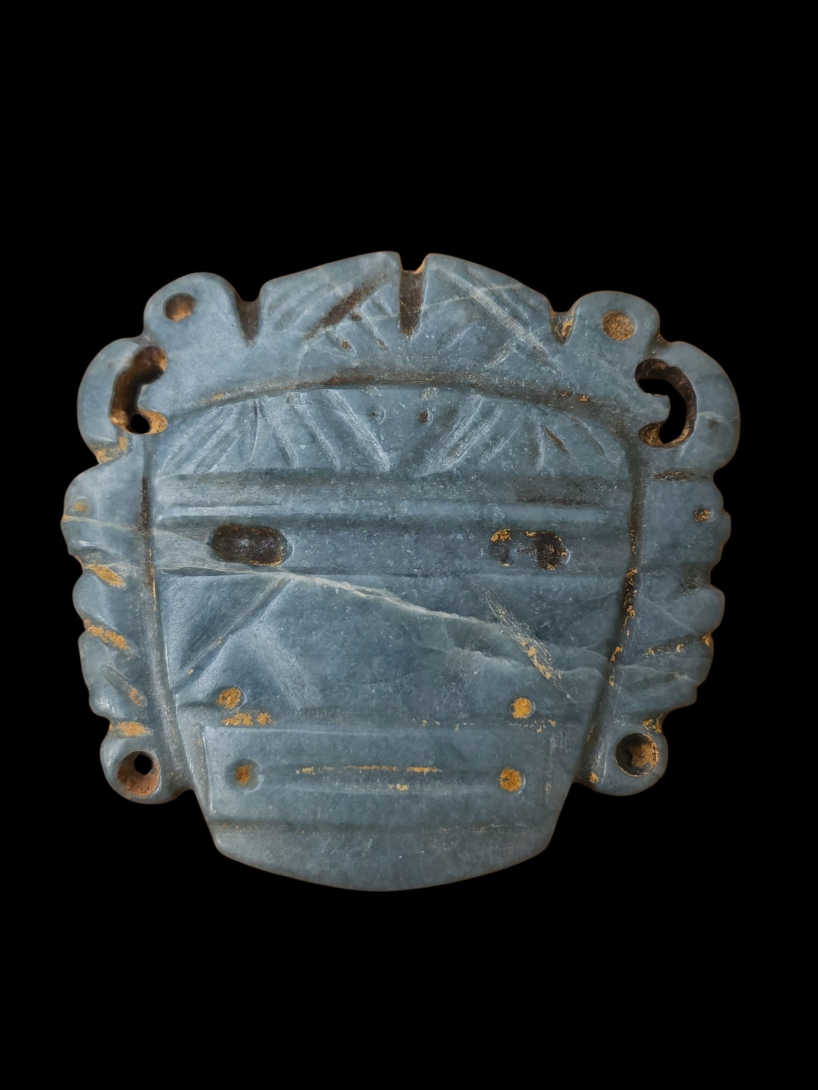 Pre-Columbian Blue Jade Maskette Pectoral: 2.25" X 2.25" Pre-Columbian Blue Jade Maskette Pectoral, Highly Stylized Pectoral, Translucent Blue Jade, Mesoamerica, Exact Age Unknown