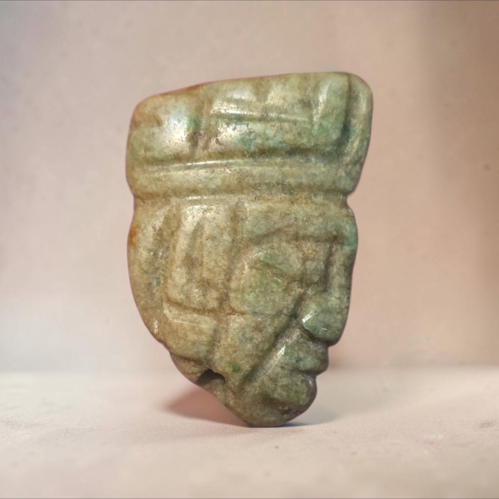 Pre-Columbian Mayan Face Pendant: 1.25" x 1" Pre-Columbian Mayan Face Pendant, Incised Line Jade Face Pendant, Excellent Patina, High Polish, Mesoamerica, 300-800 C.E.