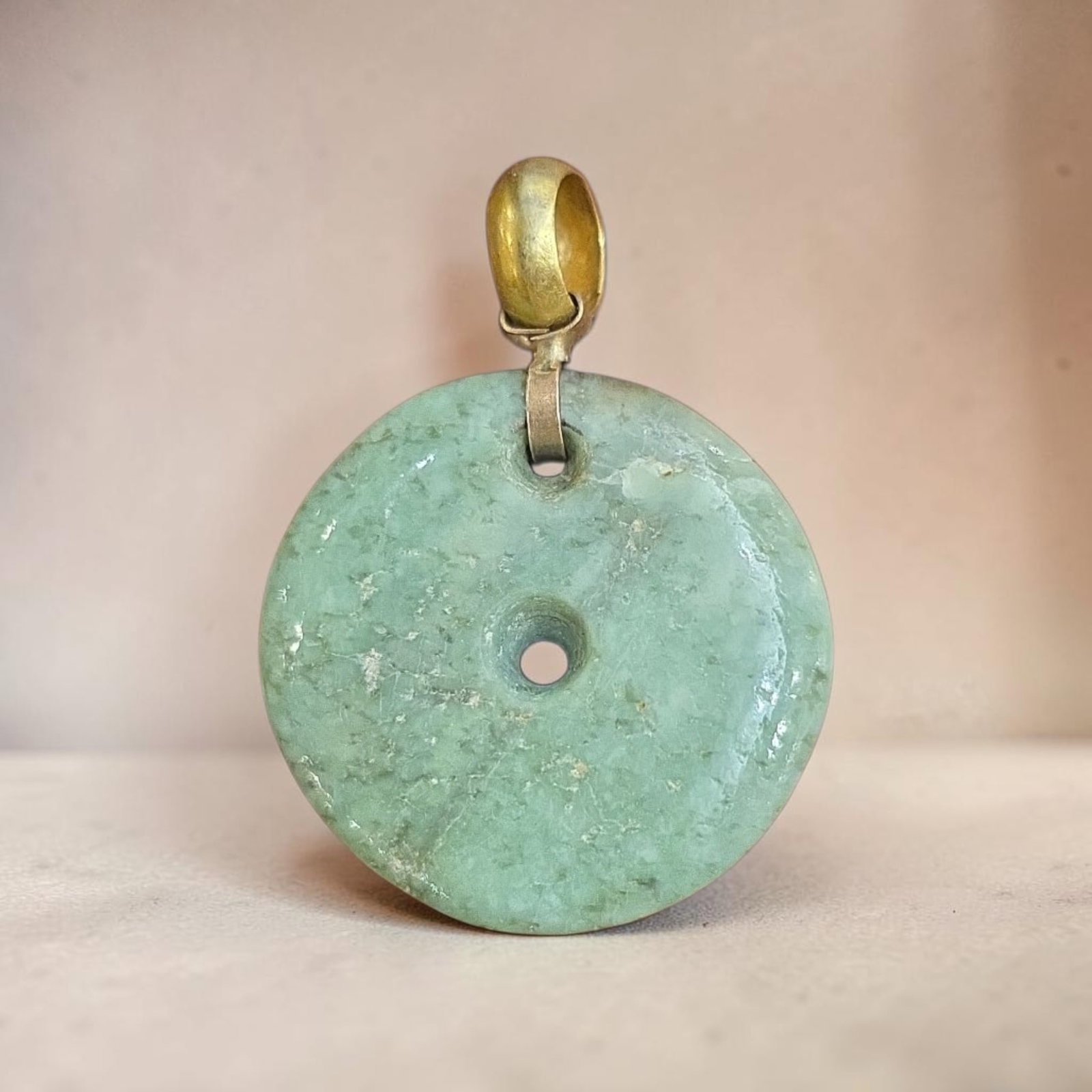Pre-Columbian Mayan Jade and Gold Pendant: 1 3/8" Pre-Columbian Mayan Jade and Gold Pendant, Jadeite Jade Disc Pendant, Gold Mayan Bail, Mesoamerica, 300-800 C.E.