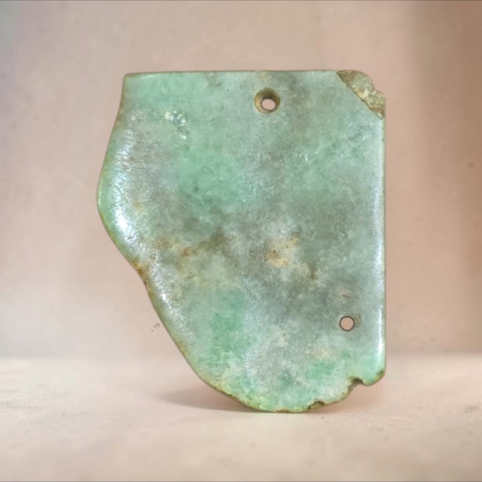 Pre-Columbian Mayan Jadeite Jade Pendant: 1 3/8" x 1 1/8" Pre-Columbian Mayan Jadeite Jade Pendant, Apple Green Jade, High Polish, Mineral Deposits, Mesoamerica, 300-800 C.E.
