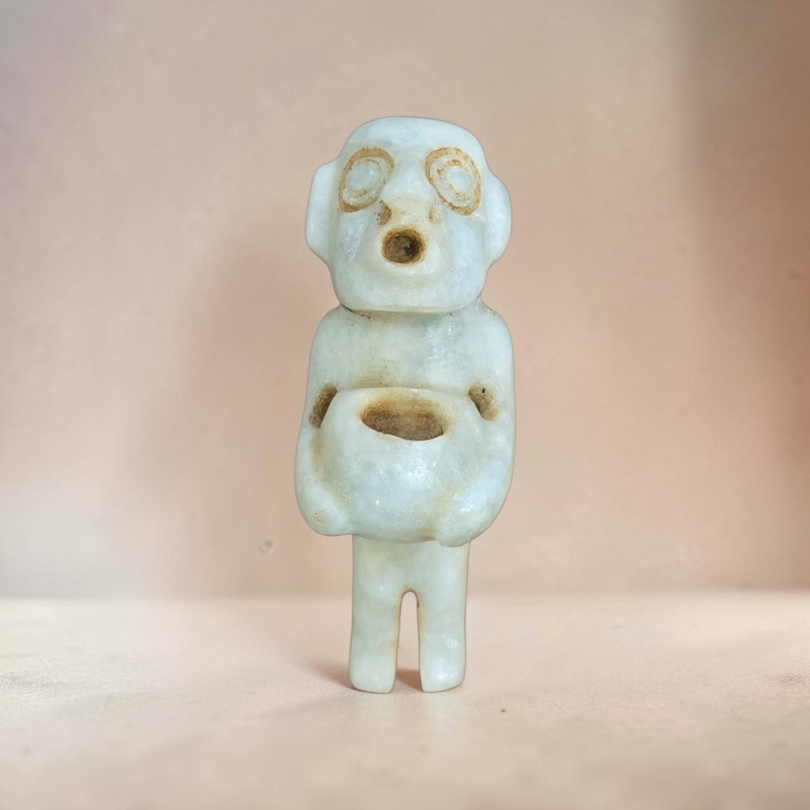 Pre-Columbian Mezcala Jade Standing Figure: 1.25" x 3.25" Pre-Columbian Mezcala Jade Standing Figure, Anthropomorphic Jade Standing Figure with Offering Bowl, Stylized Human Form, Hollowed Circular mouth and eyes, Western Gurerro Region, 100-30