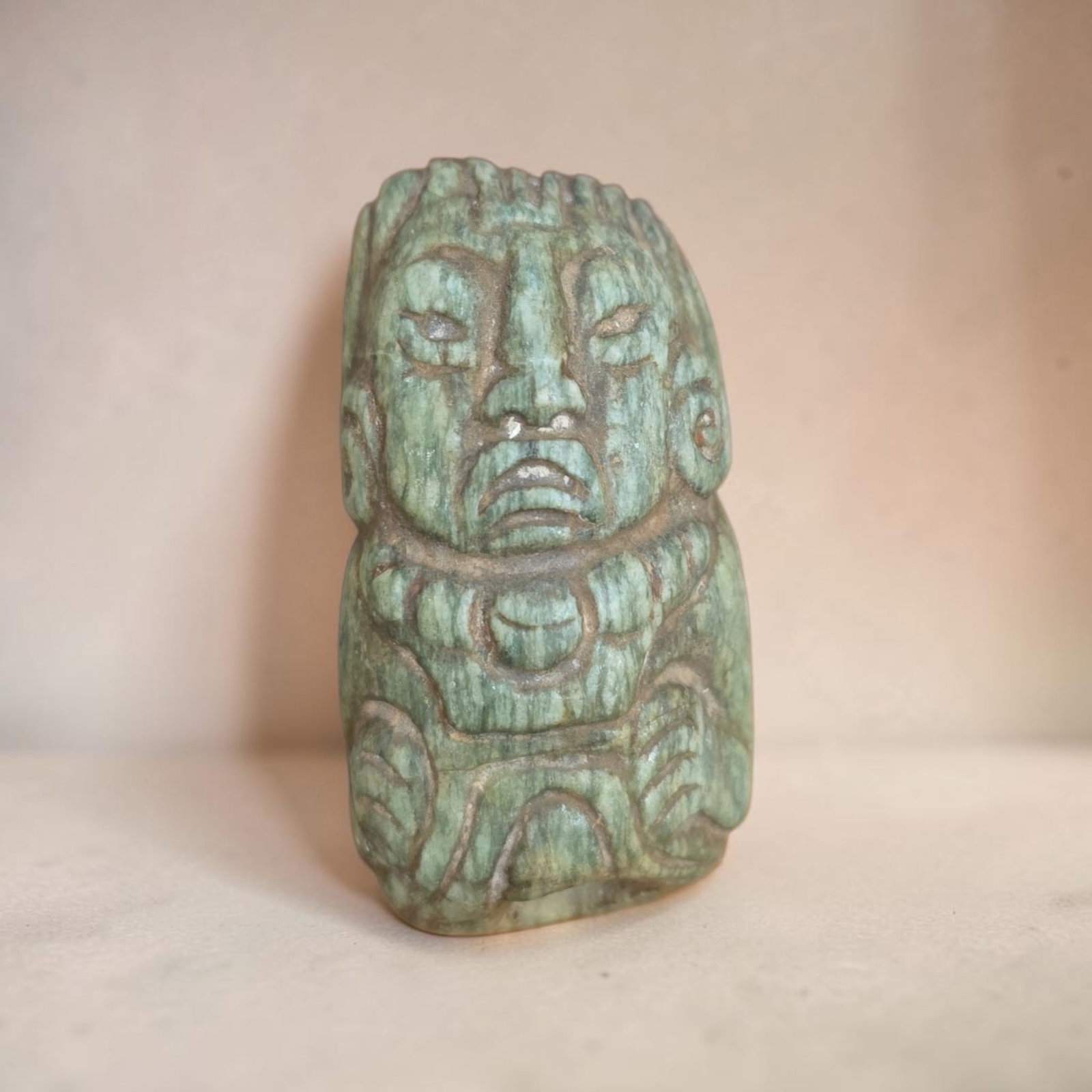 Pre-Columbian Olmec Cultural Jade Effigy Bead: 2.25" x 1.25" Pre-Columbian Olmec Jade Effigy Bead, Cultural Jade Effigy Bead with Human Form Depiction, Traditional Ceremonial Attire with Necklace and Earflares, Olmec Culture, 200 B.C.E- 200 C.E.