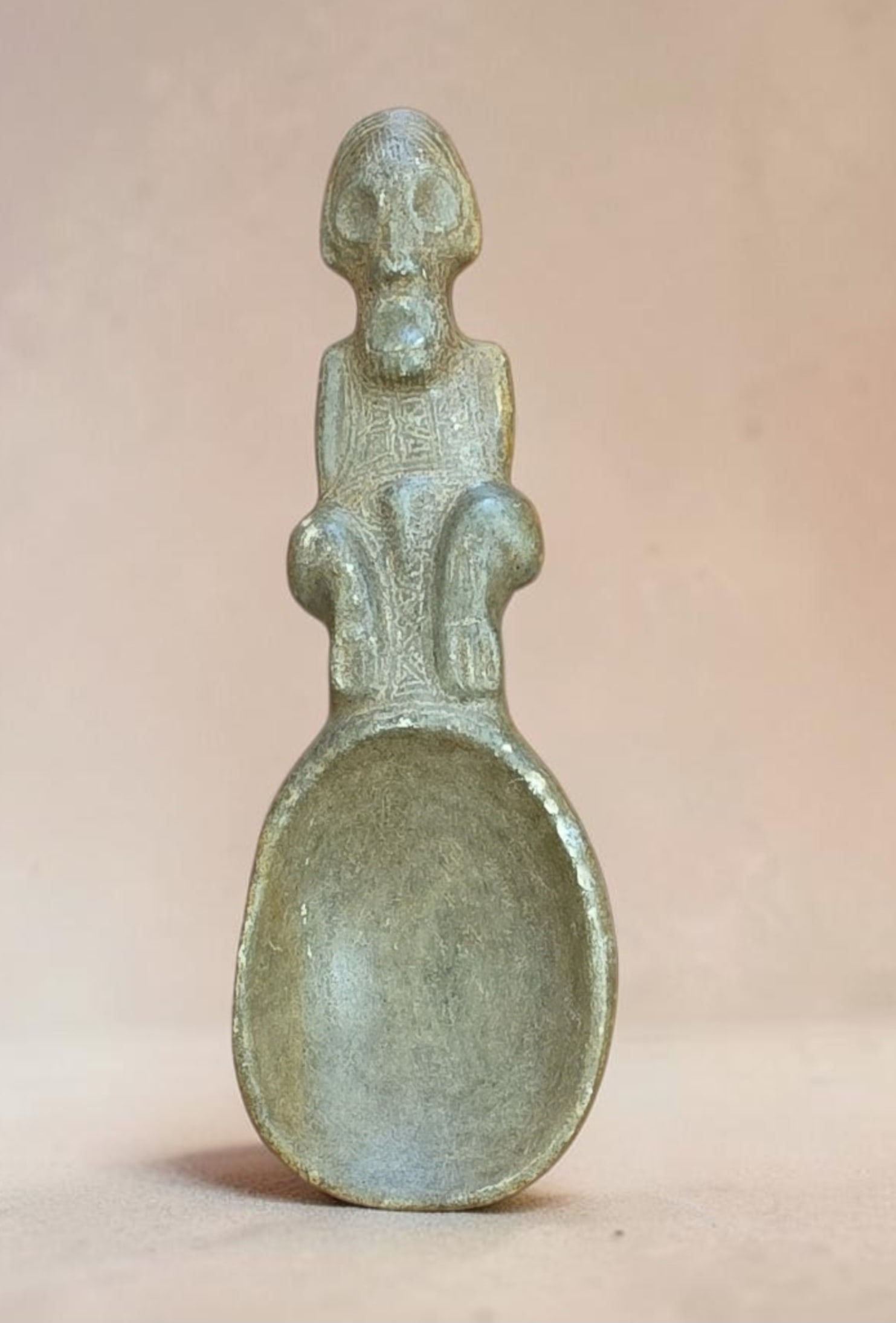 Pre-Columbian Taino Ritual Cohoba Spoon: 15" x 5.5" Pre-Columbian Taino Ritual Cohoba Spoon, Green Stone heavy with Mineral Deposits, Carved Crouching Zemi, Elongated Skeletal head, Prominent Eye Sockets, Gaunt Visage, Taino Culture,