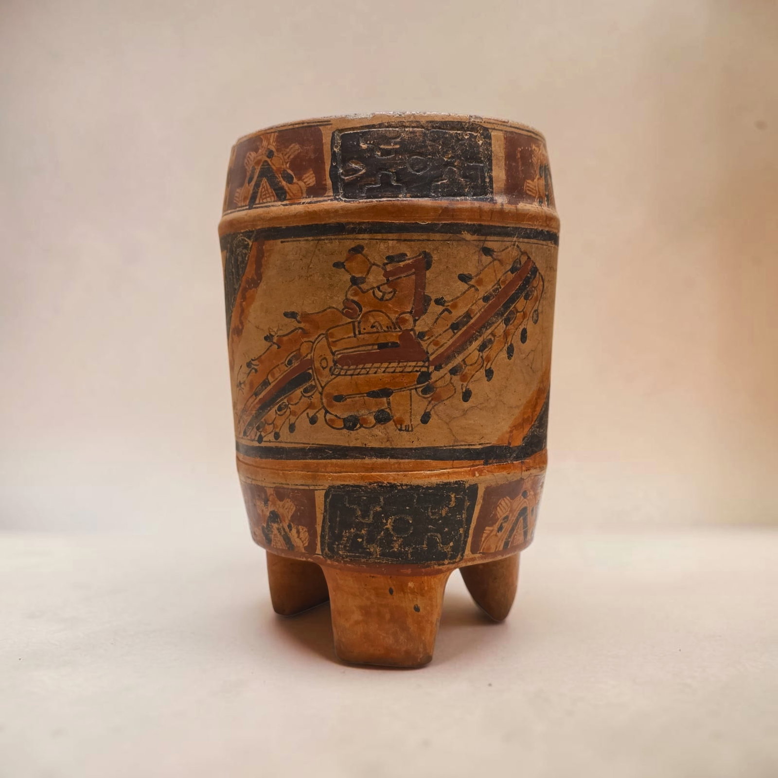Pre-Columbian Mayan Elite Tripod Cylinder Vessel: 8.25" x 5.25" Pre-Columbian Mayan Elite Tripod Cylinder Vessel, Black Red and Orange Slip, Seated Ceremonial Figures, Nobles, Dancers and Mythic Personages framed by upper and lower Glyphic Bands, Use