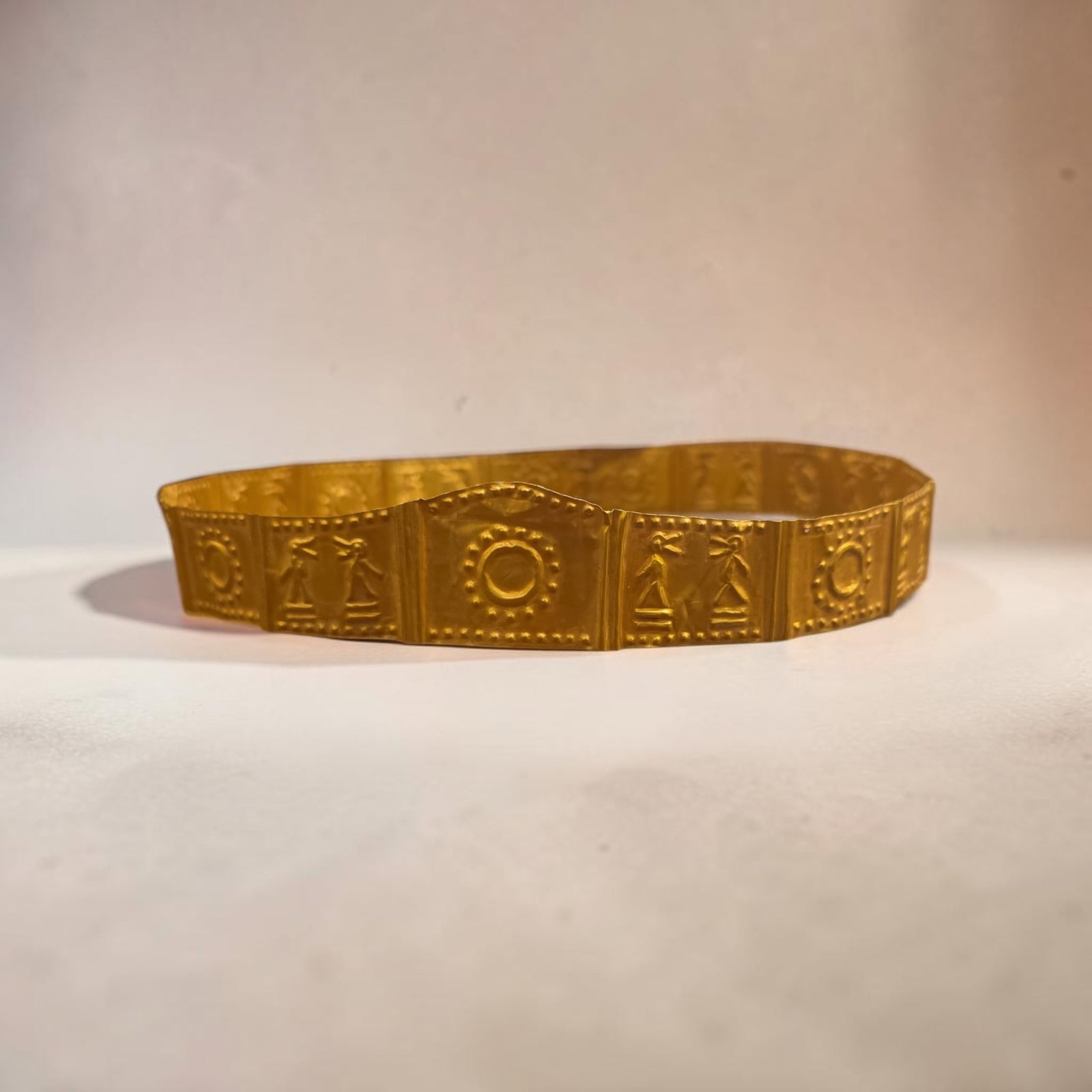 Authentic Pre-Columban Gold Colima Crown, Solid Gold Sheet with Repousse: 6" Authentic Pre-Columban Gold Colima Crown, Authentic Gold Crown, Thin Sheet Of Hammered Gold Using Repousse, Figurative Panel With Stylized Anthropomorphic Figures And The Sun, Elite and Ruler Regal