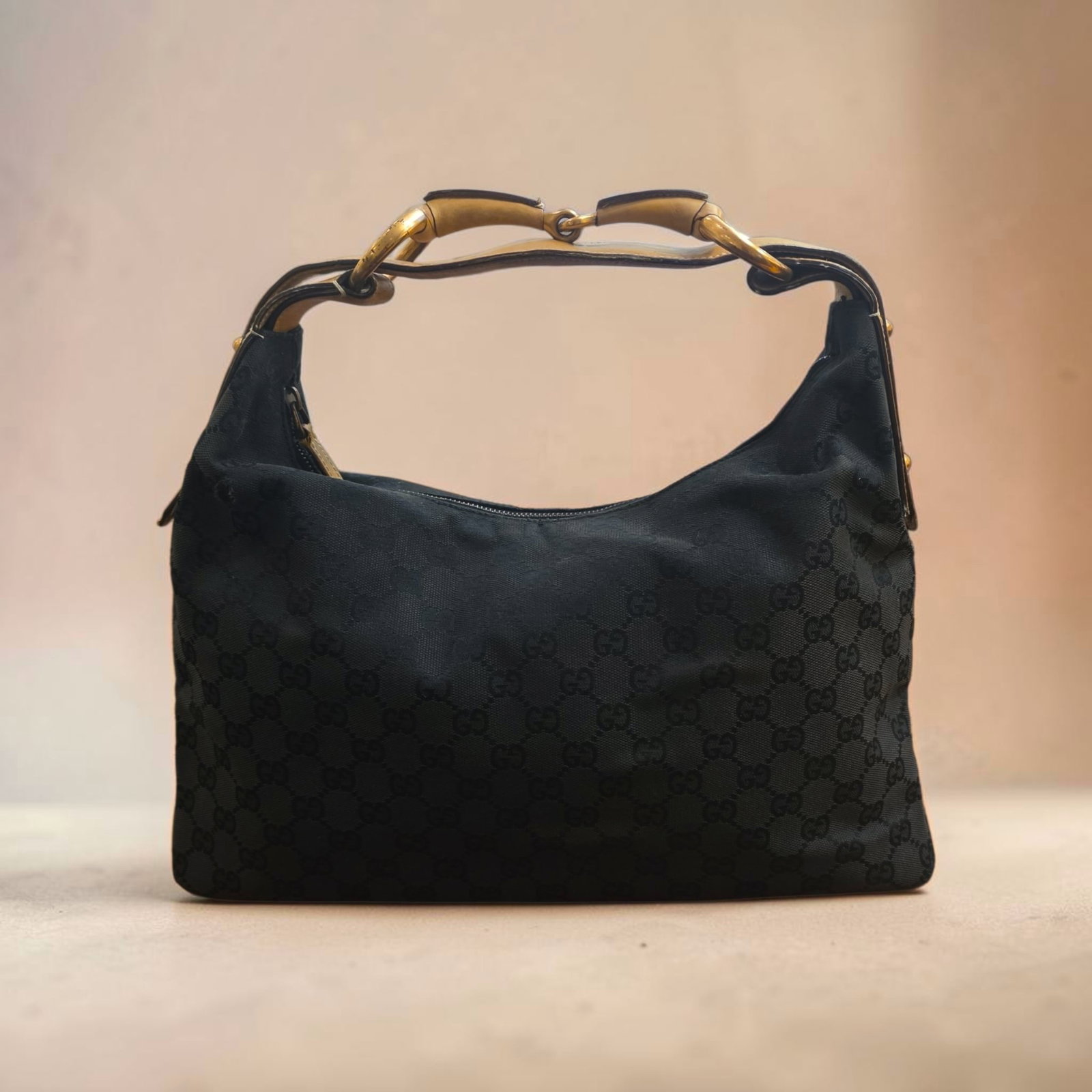 Authentic Gucci GG Canvas Horsebit Shoulder Bag: 14.6" x 9.8" x 3.5" Authentic Gucci GG Canvas Horsebit Shoulder Bag Gucci horsebit bag from the Tom Ford era. An iconic hobo style, it?s crafted with sleek black monogram fabric and beige leather, Som