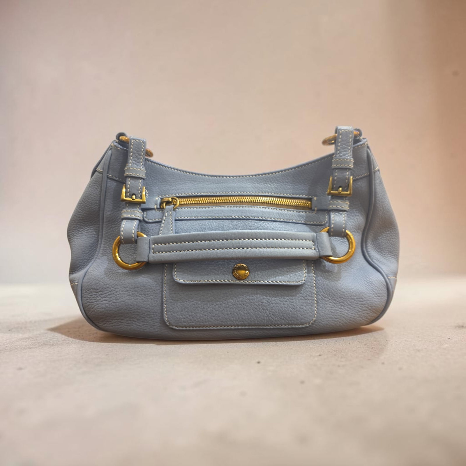 Authentic Vitello Daino Leather Shoulder Bag, Light Blue: 9.5" x 9.25" x 6" Authentic Vitello Daino Leather Shoulder Bag, Light Blue, Vitello Daino Leather & Enameled Metal Triangle, Leather Trim Embellishment & Three Exterior Pockets, Gold Tone Hardware, Lo