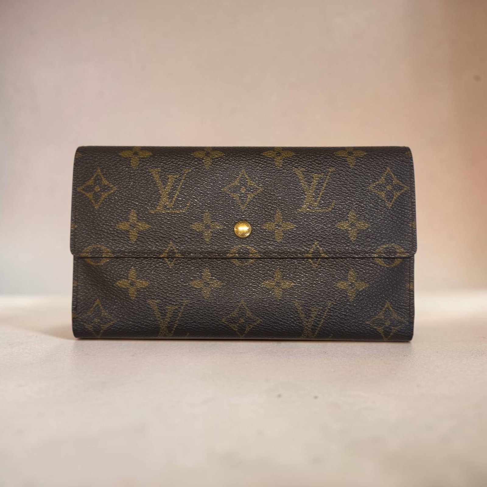 Authentic Louis Vuitton Tri-Fold Wallet, Vintage Monogram Porte Tresor International Wallet: 7.5" x 4.2" Authentic Louis Vuitton Tri-Fold Wallet, Vintage Monogram, Great Used Condition, Date Code MI0915