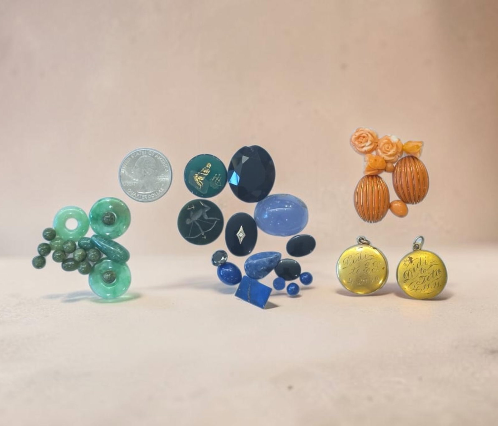 Assortment of vintage jewelry elements: .25"-1" Assortment of vintage jewelry elements, jade components, blue cabochons and intaglio stones, Lapis, Sapphire, Chalcedony, Angel Skin Coral, Italian Coral, and engraved gold-toned commemorative
