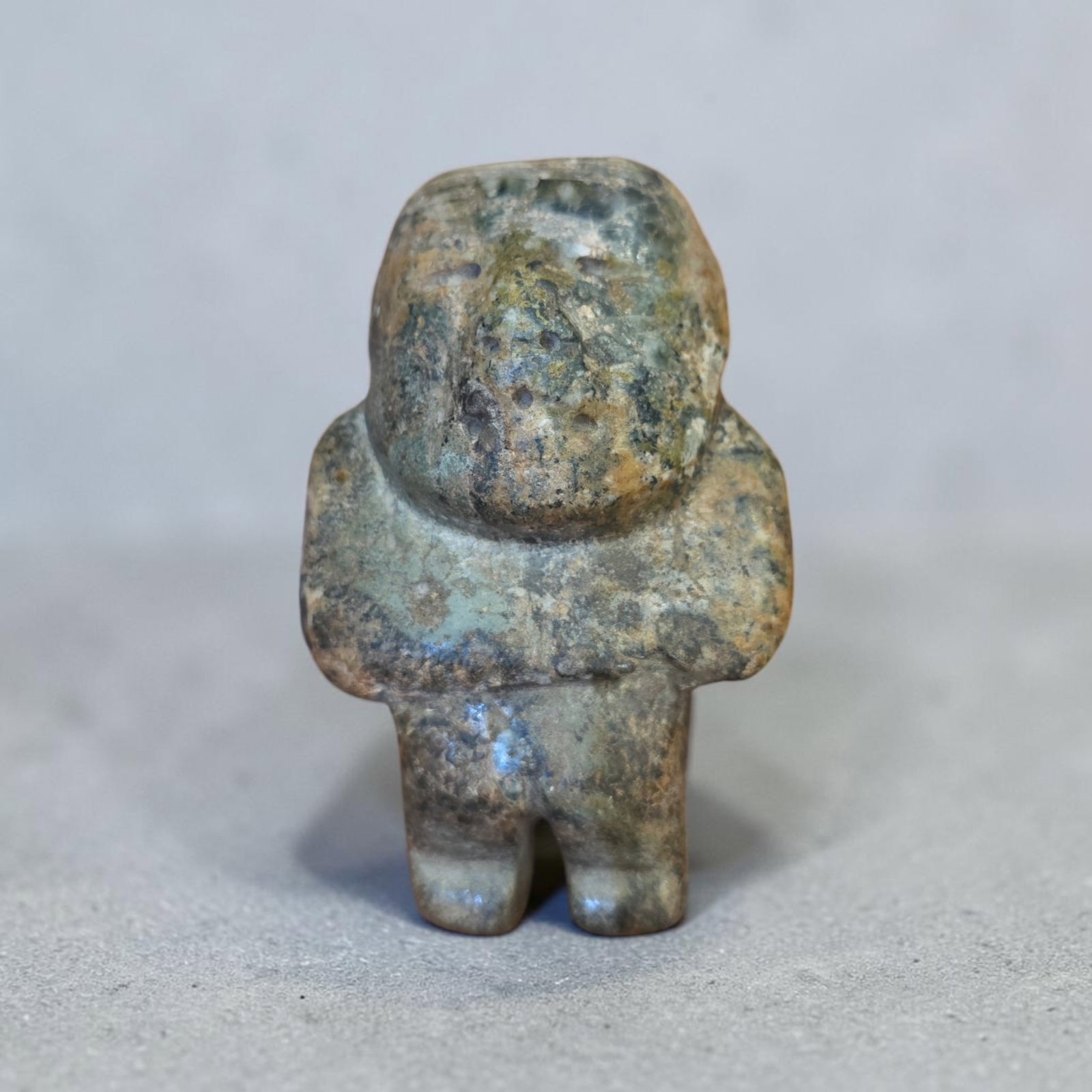 Pre-Columbian Chontal Jade Standing Figure: 3.5" x 2.25", Pre-Columbian Chontal Jade Standing Figure , Heavy Calcification, Mineral Deposits, Prominent Shoulders, Recessed Eyes, Distinct Seperated Legs, Mezcala Culture 700 BCE- 200BCE
