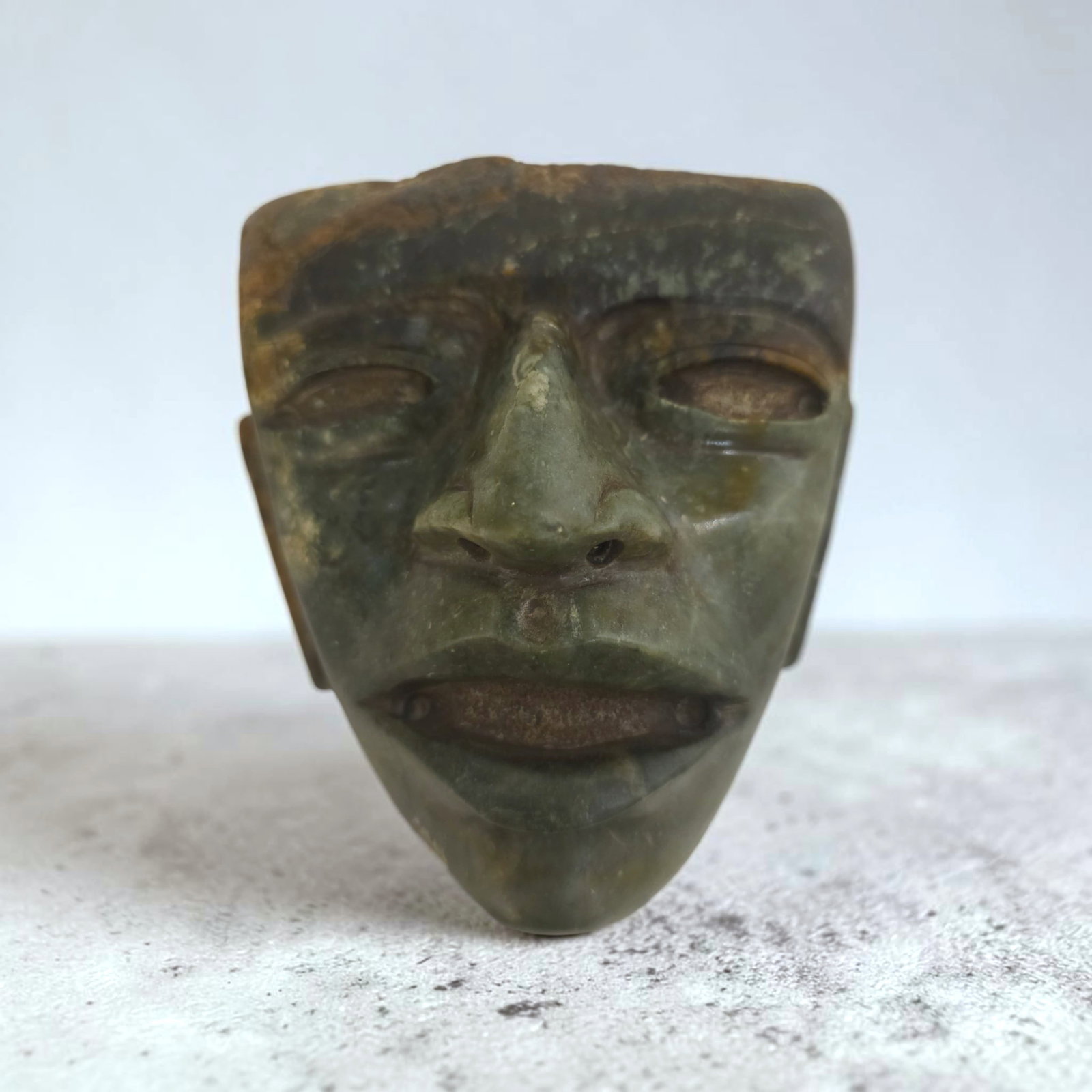 Pre-Columbian Teotihuacan Jade Maskette: 5" x 3.75", Pre-Columbian Teotihuacan Jade Maskette, Symmertrical Face with Prominent Nose, Heavy Brow, Parted Lips, Mesoamerica, 200-700 CE