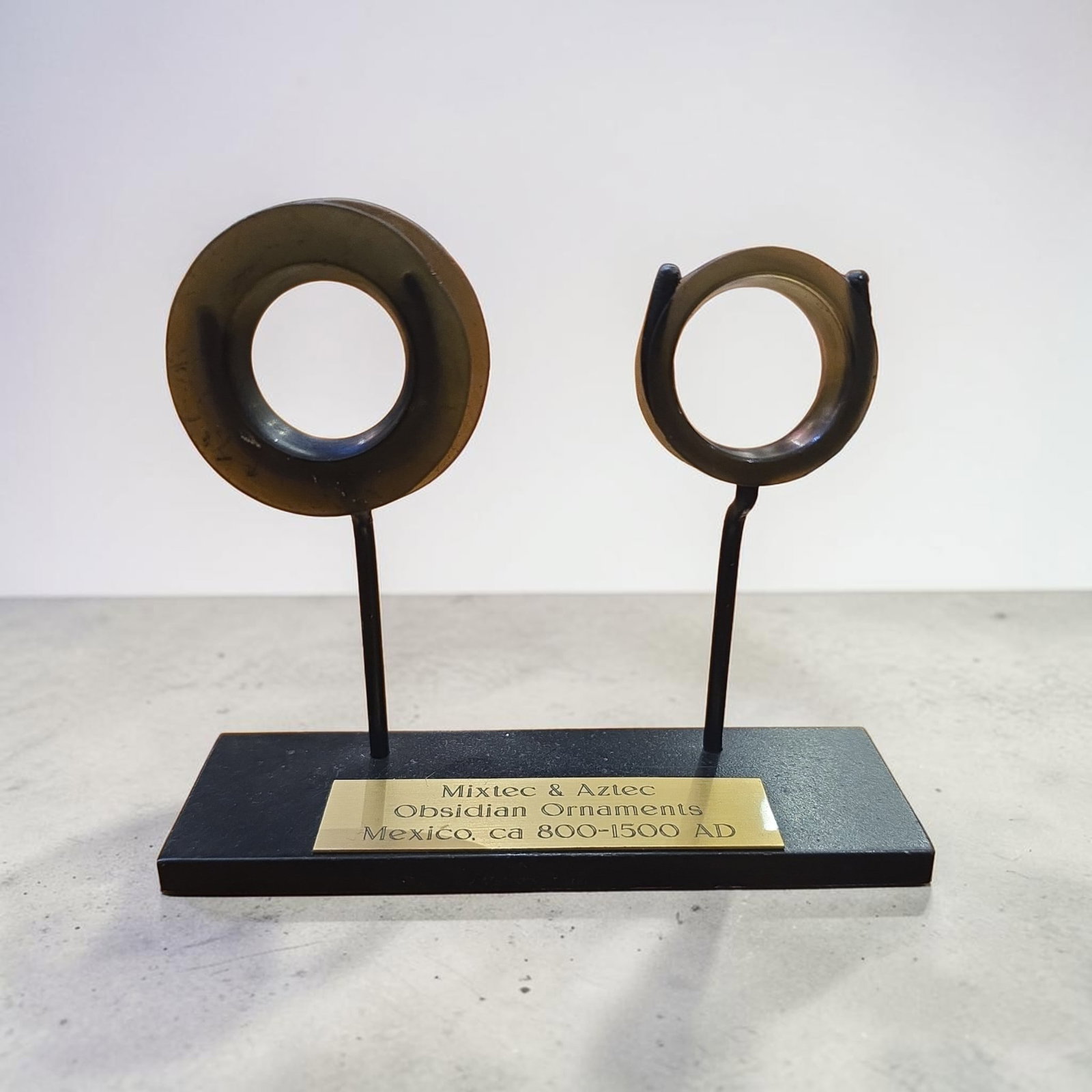 Pre-Columbian Obsidian Ear Ornaments, Published In Book: 1.75", Pre-Columbian Obsidian Ear Ornaments, Published In Book Carved in Stone by TJ Mcullough, Finely Carved Obsidian Ear Flares, Pair of 2 Custom Display Stand, Mesoamerica 800-1500 A.D. Sizes