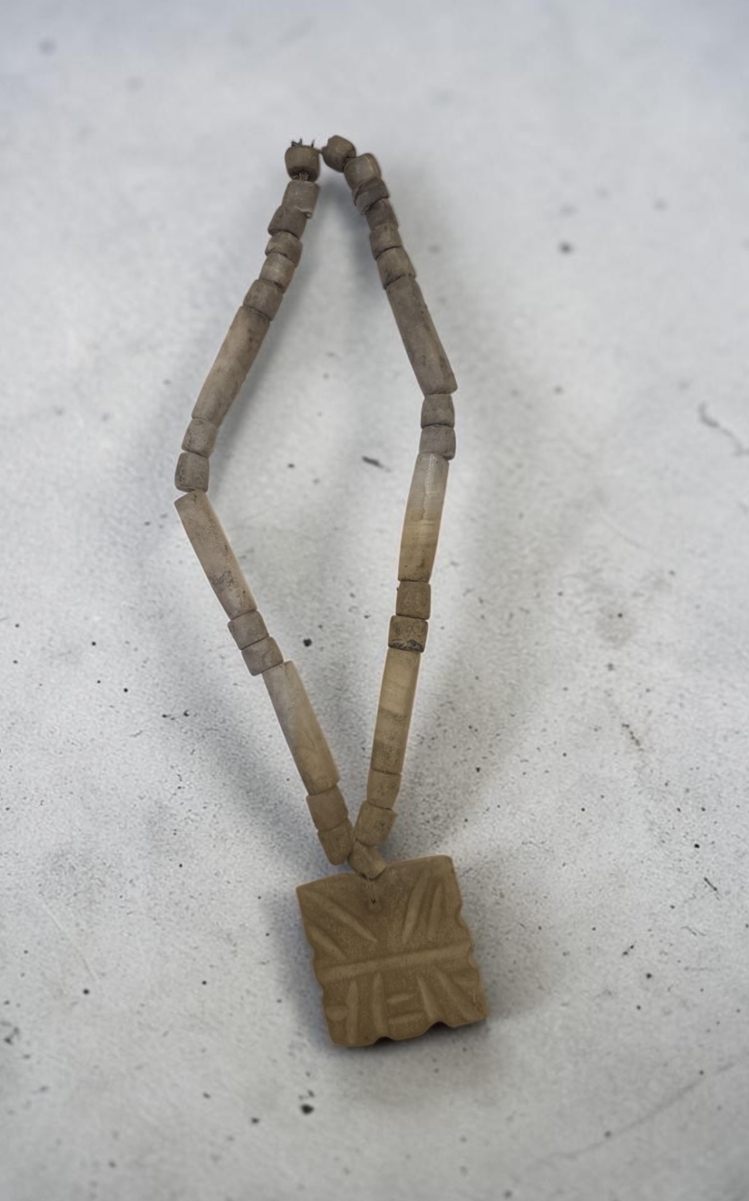 Pre-Columbian Stone Beaded Necklace: 10.25", Pre-Columbian Stone Beaded Necklace, Various Stone Tube Beads and Carved Center Pendant, Mesoamerica 500-900 C.E.