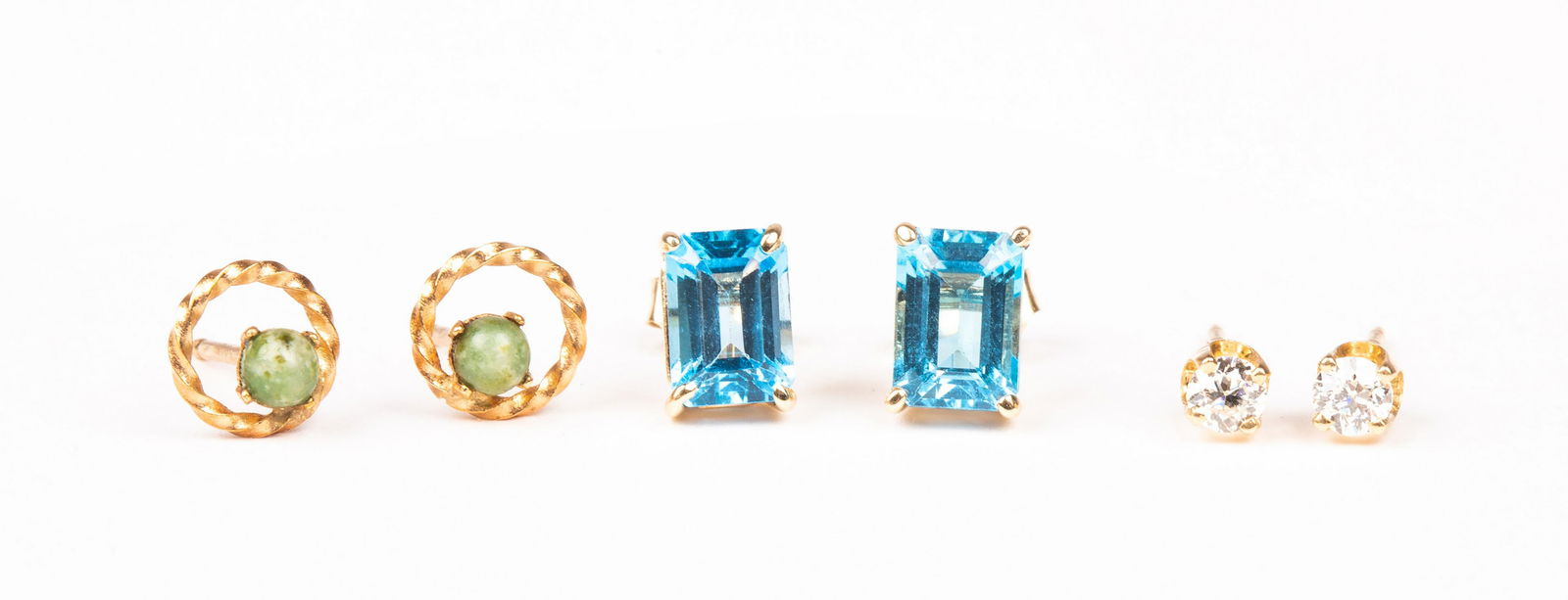 Three Pairs of Gold Stud Earrings: Three Pairs of Gold Stud Earrings, Includes: an unmarked pair of diamond studs with no backs, totaling .20 carats (one diamond needs tightening); a pair of unmarked circle and jade studs, and a marked