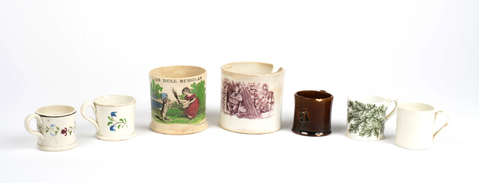 Seven Antique Soft Paste Cups: Seven Antique Soft Paste Cups, two larger both with damage including edge chips and broken handles and five miniature child's toy size cups, three with decoration, one white and a brown glazed with ap