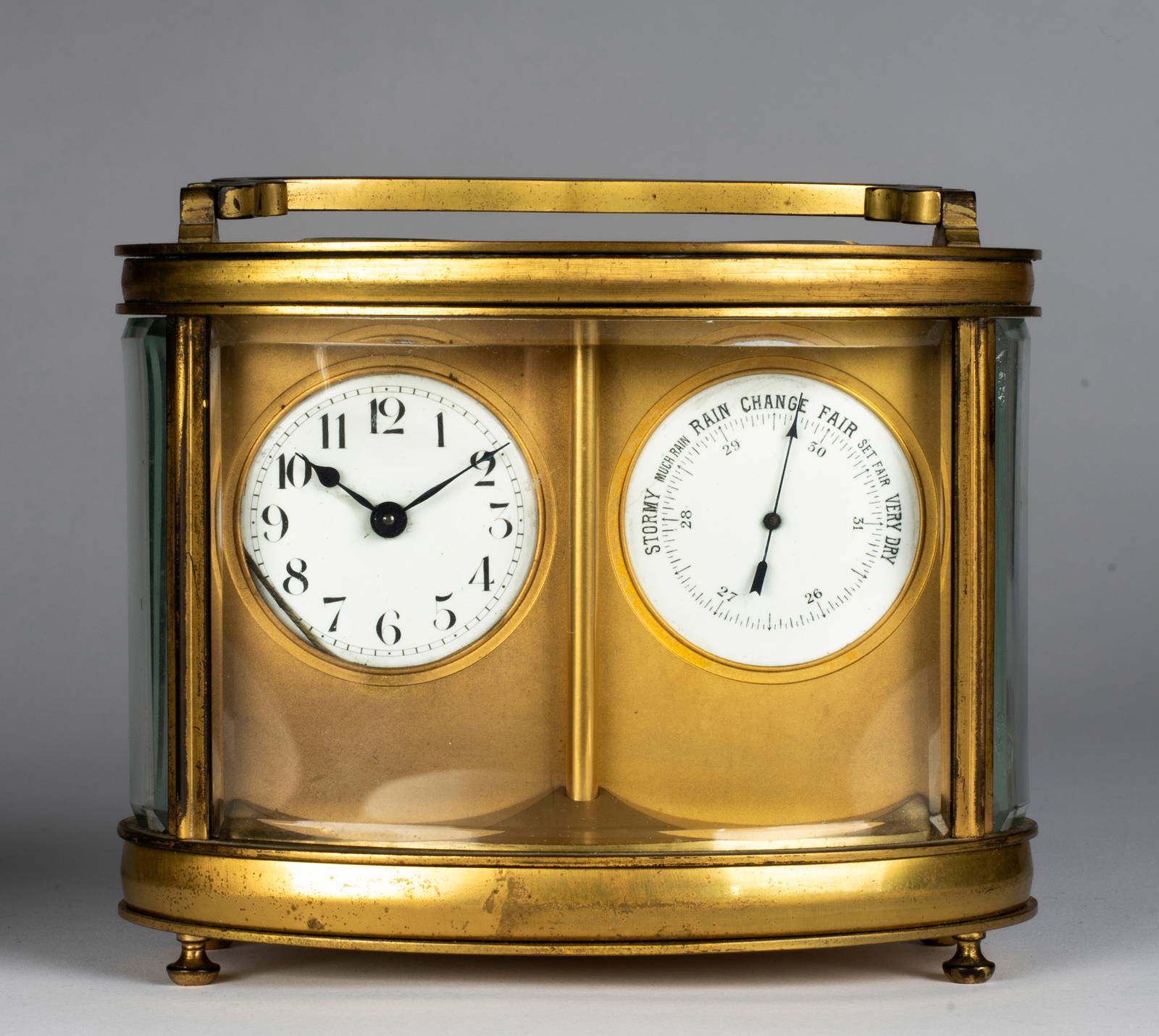 An Antique French Oval Double Carriage Clock And Barometer, Possibly
